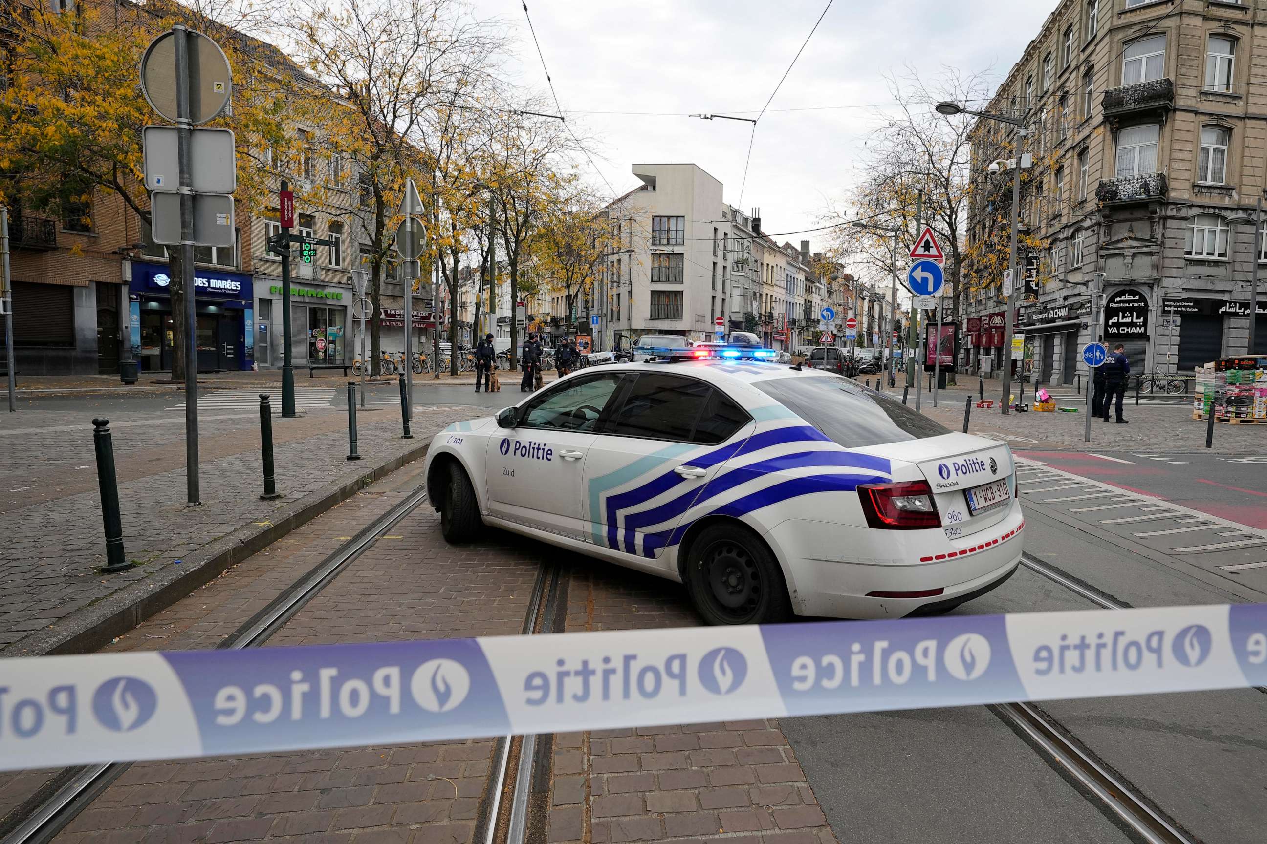 PHOTO: Belgian Police stand behind a cordoned off area close to where a suspected Tunisian extremist has been shot dead hours after manhunt looking for him Tuesday, Oct. 17, 2023.