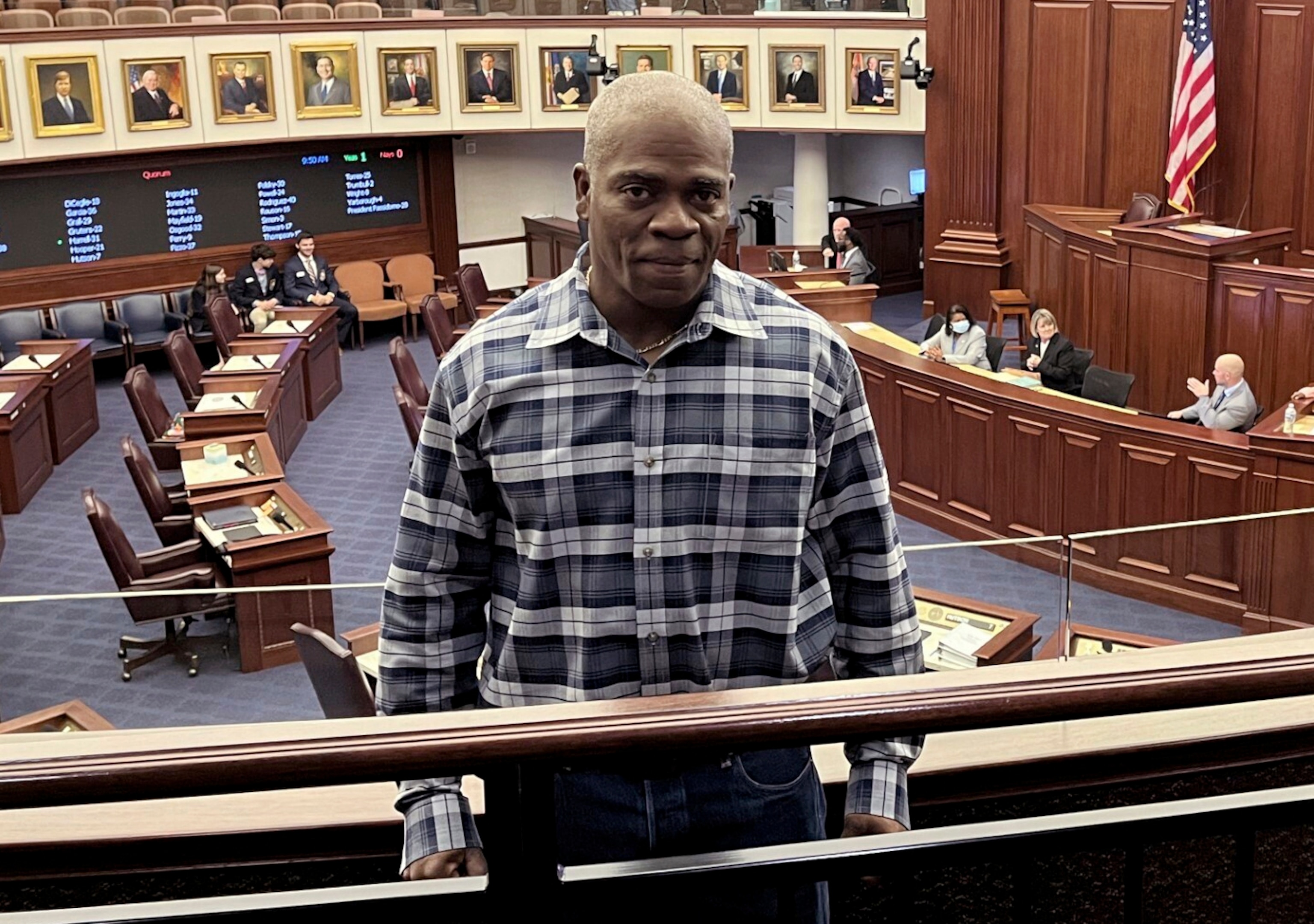 PHOTO: In this photo provided by the Innocence Project of Florida, Leonard Allen Cure poses from the floor of the Florida legislature in Tallahassee, Fla., April 2023.