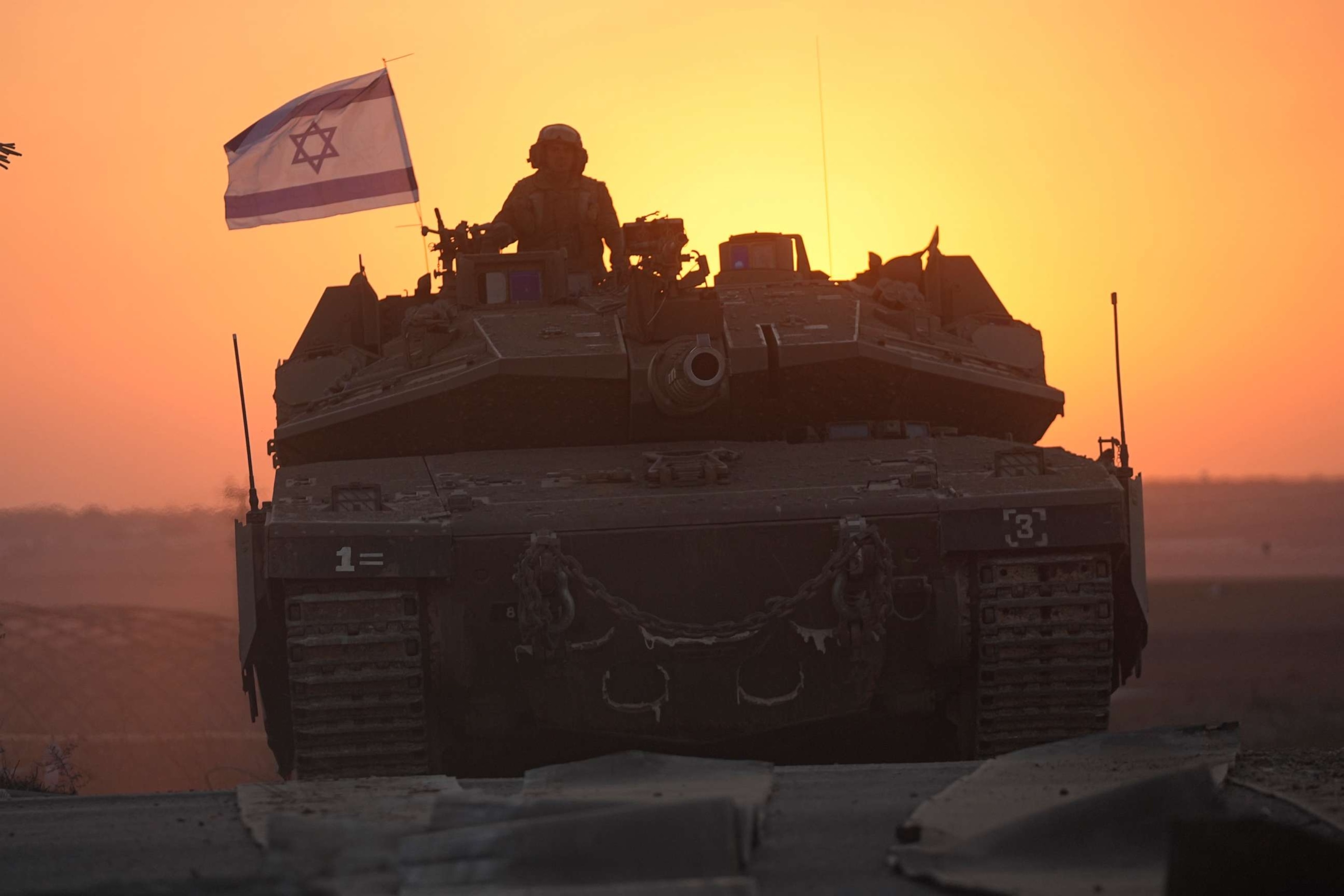 PHOTO: Israeli tanks head towards the Gaza Strip border in southern Israel on Thursday, Oct. 12, 2023.