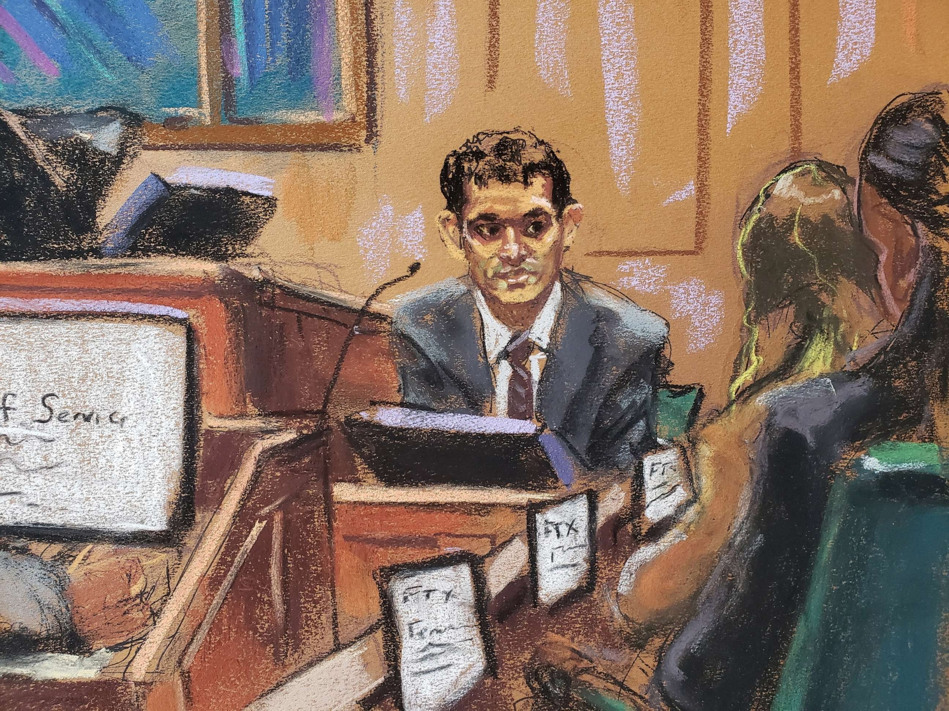 PHOTO: FTX founder Sam Bankman-Fried is questioned by lawyer Mark Cohen (not pictured) as he testifies in his fraud trial over the collapse of the bankrupt cryptocurrency exchange, at federal court in New York City, Oct. 27, 2023 in this courtroom sketch.