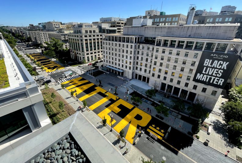 WASHINGTON, DC - MAY 13: Black Lives Matter Plaza on 16th Street is repainted following the removal of the lettering for a construction project on May 13, 2021 in Washington, DC. The words "Black Lives Matter" was painted on the two block section of 16th Street last year in the wake of the George Floyd protest. (Photo by Kevin Dietsch/Getty Images)