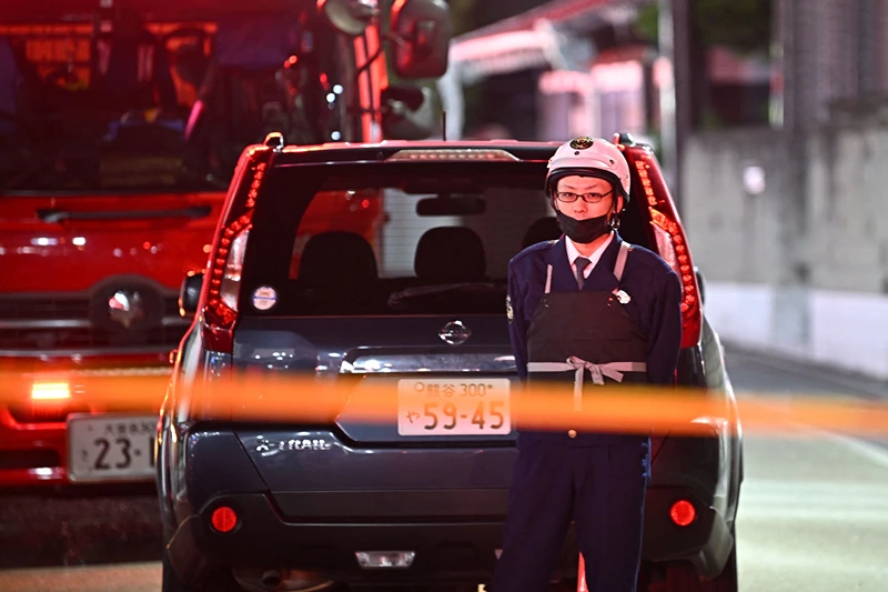 JAPAN-CRIME
Police officers guard the area around a post office where a suspected gunman has taken an unknown number of people hostage in Warabi city, Saitama prefecture on October 31, 2023. (Photo by Philip FONG / AFP) / "The erroneous mention[s] appearing in the metadata of this photo by Philip FONG has been modified in AFP systems in the following manner: [Credit to AFP] instead of [JIJI Press and Japan out]. Please immediately remove the erroneous mention[s] from all your online services and delete it (them) from your servers. If you have been authorized by AFP to distribute it (them) to third parties, please ensure that the same actions are carried out by them. Failure to promptly comply with these instructions will entail liability on your part for any continued or post notification usage. Therefore we thank you very much for all your attention and prompt action. We are sorry for the inconvenience this notification may cause and remain at your disposal for any further information you may require." (Photo by PHILIP FONG/AFP via Getty Images)