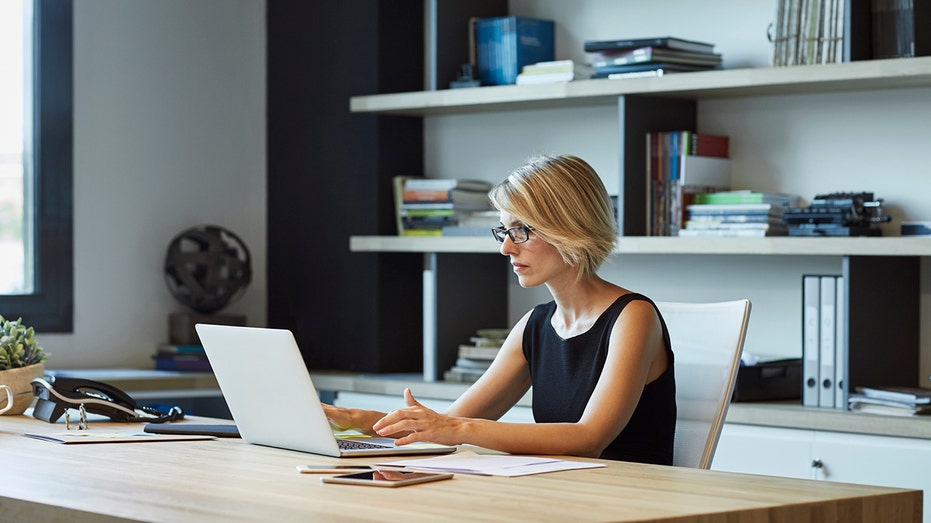 woman using laptop