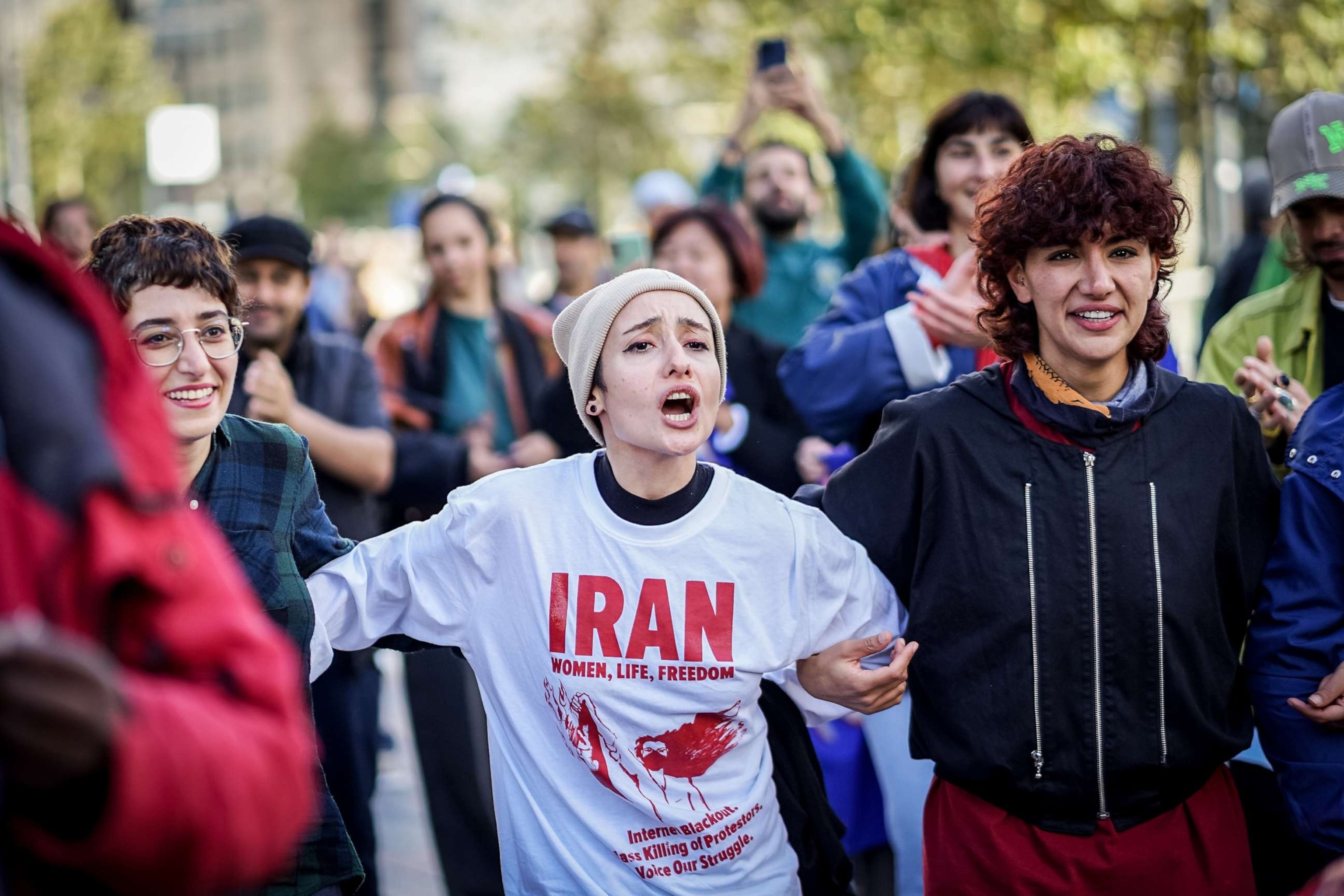 PHOTO: Protesters are seen dancing in solidarity with women in Iran at station square in Rotterdam, Netherlands, on Oct. 2, 2022.