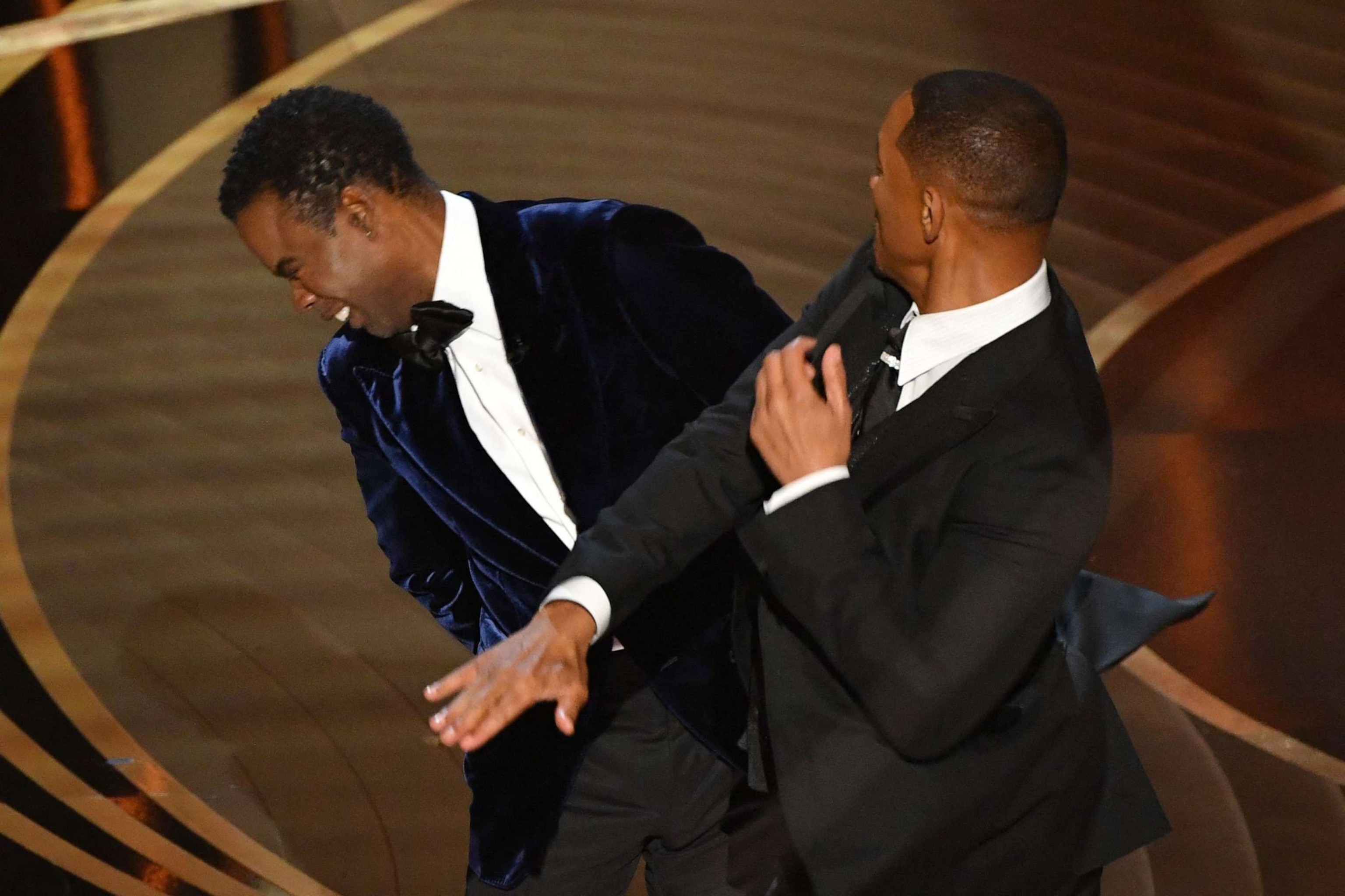 PHOTO: Will Smith slaps Chris Rock onstage during the 94th Oscars at the Dolby Theatre in Hollywood, California on March 27, 2022.