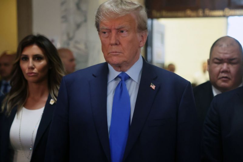 NEW YORK, NEW YORK - OCTOBER 02: Former President Donald Trump speaks to the media as he arrives at New York State Supreme Court to start the civil fraud trial against him on October 02, 2023 in New York City. Former President Trump may be forced to sell off his properties after Justice Arthur Engoron canceled his business certificates and ruled that he committed fraud for years while building his real estate empire after being sued by Attorney General Letitia James, seeking $250 million in damages. The trial will determine how much he and his companies will be penalized for the fraud. (Photo by Spencer Platt/Getty Images)