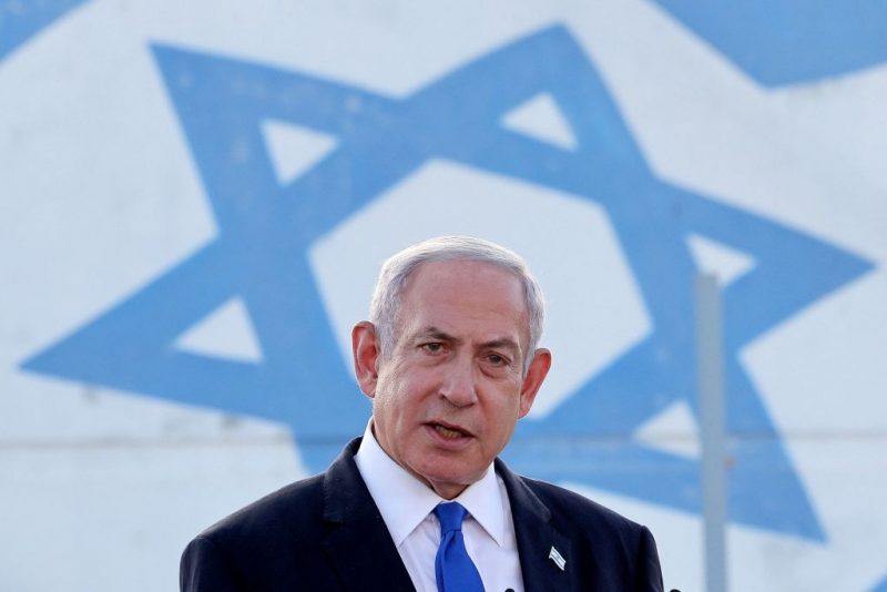 TOPSHOT - Israel's Prime Minister Benjamin Netanyahu delivers a speech during his visit to an Israeli unmanned aerial vehicle (UAV) centre, at the Palmachim Airbase near the city of Rishon LeZion on July 5, 2023. (Photo by JACK GUEZ / AFP) (Photo by JACK GUEZ/AFP via Getty Images)