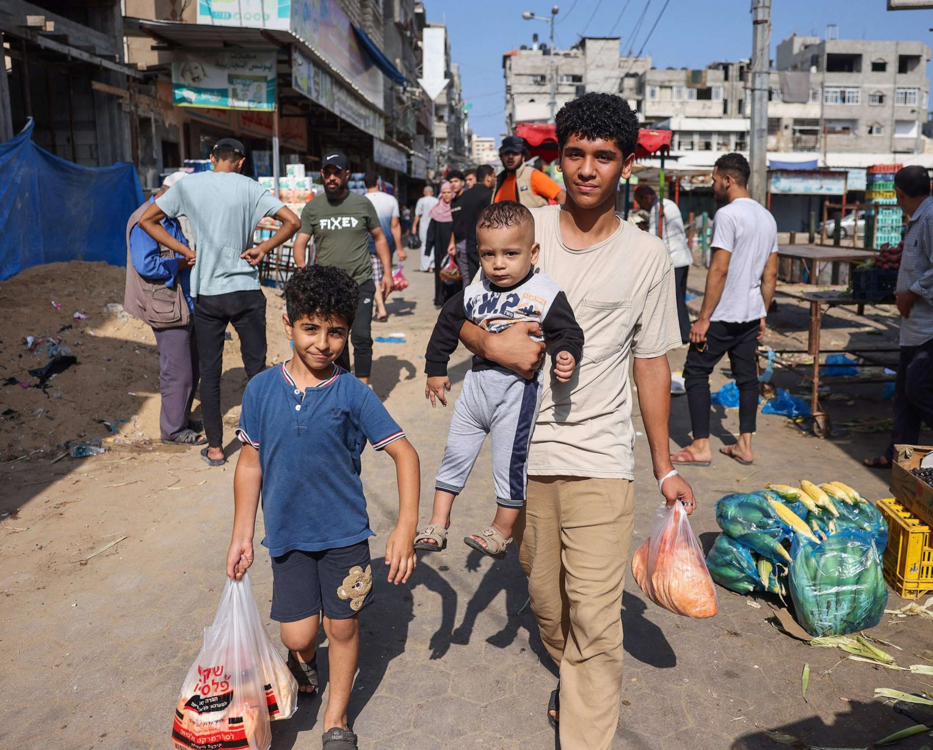 PHOTO: People buy fresh produce at a market in Gaza city, Oct. 10, 2023.