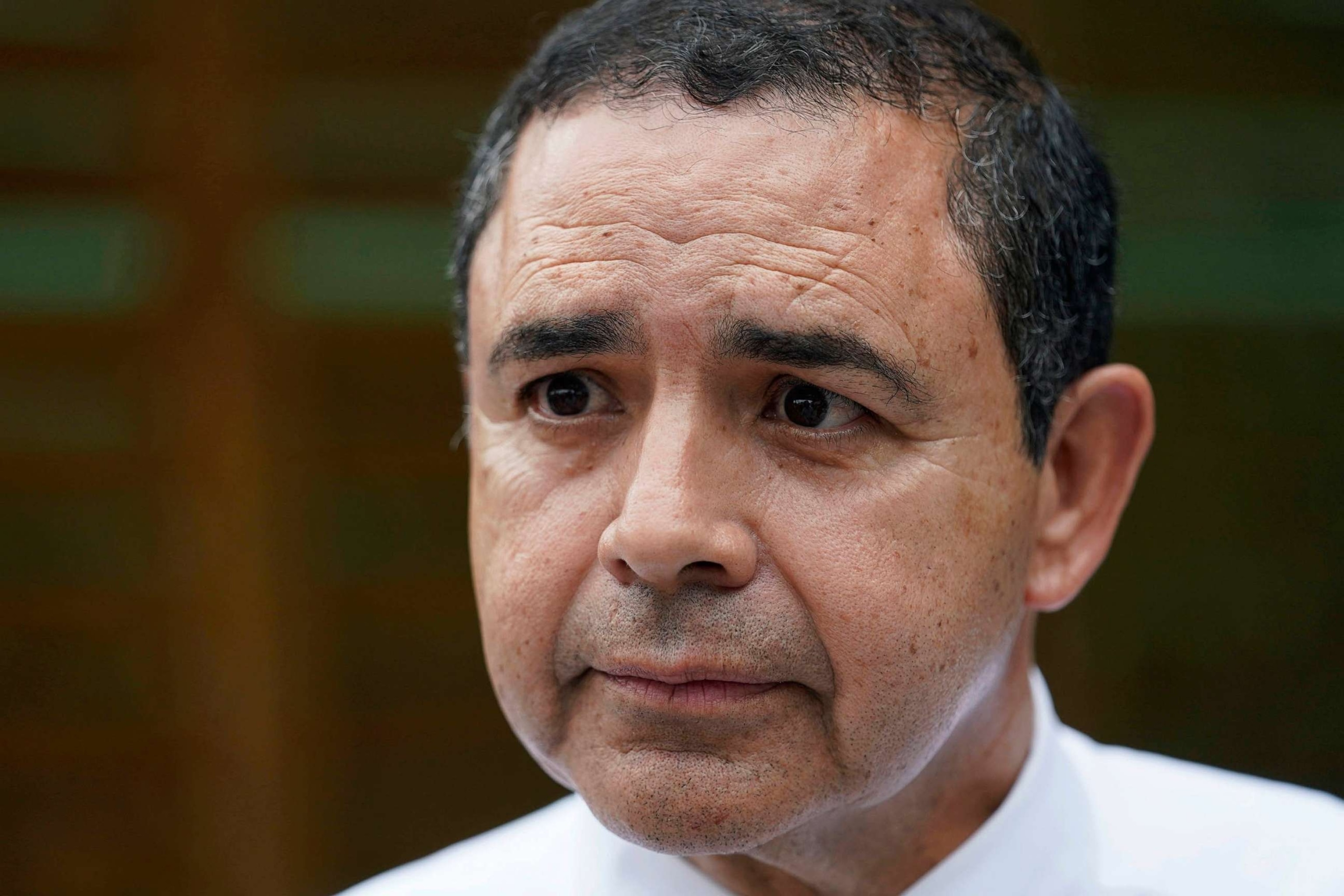 PHOTO: FILE - Rep. Henry Cuellar, D-Texas, talks to a member of the media during a campaign event in San Antonio, May 4, 2022.