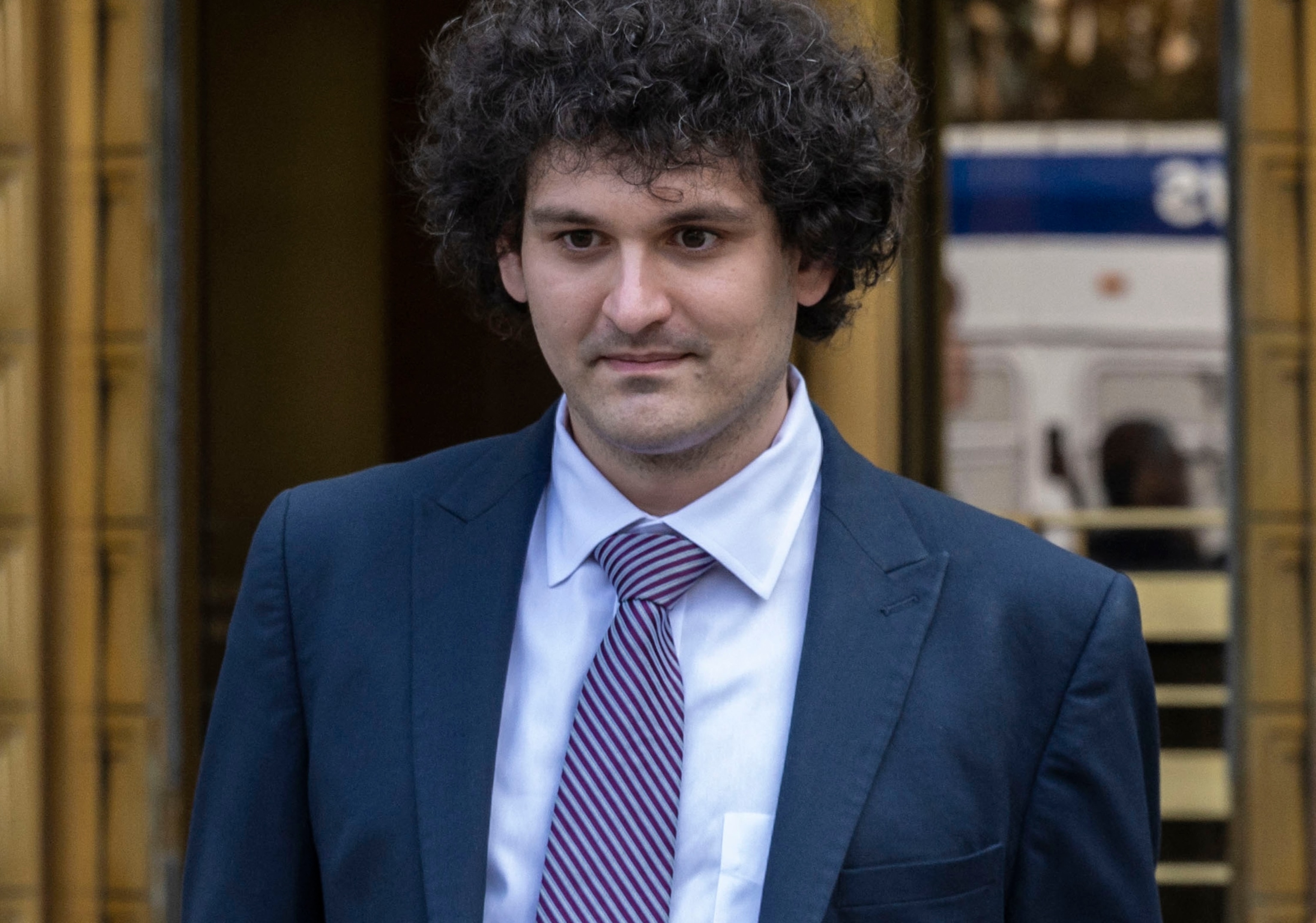 PHOTO: Former FTX chief Sam Bankman-Fried leaves the Federal Courthouse following a bail hearing ahead of his October trial, July 26, 2023, in New York.