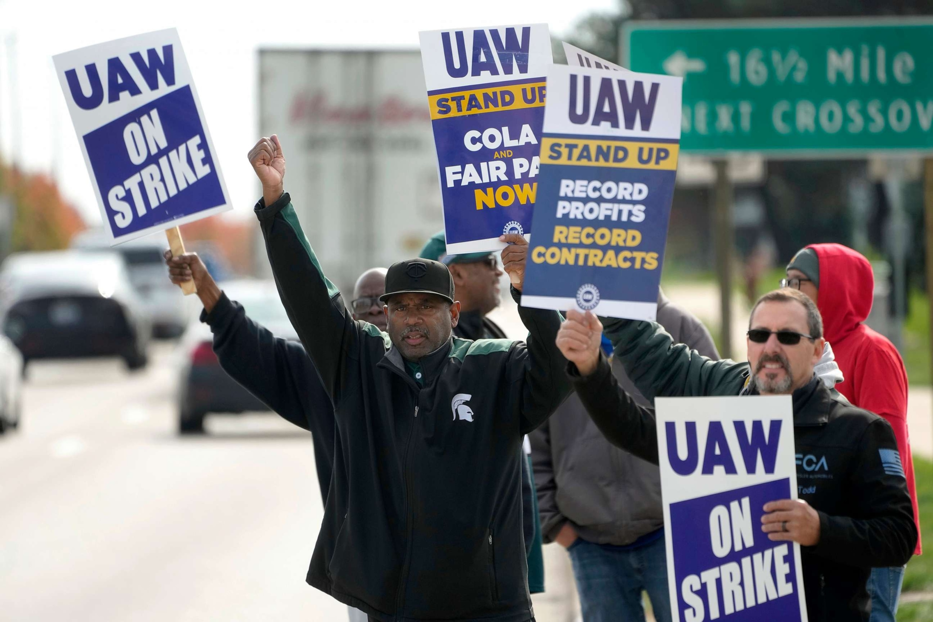 PHOTO: United Auto Workers members walk the picket line during a strike at the Stellantis Sterling Heights Assembly Plant, in Sterling Heights, Mich., on Oct. 23, 2023.