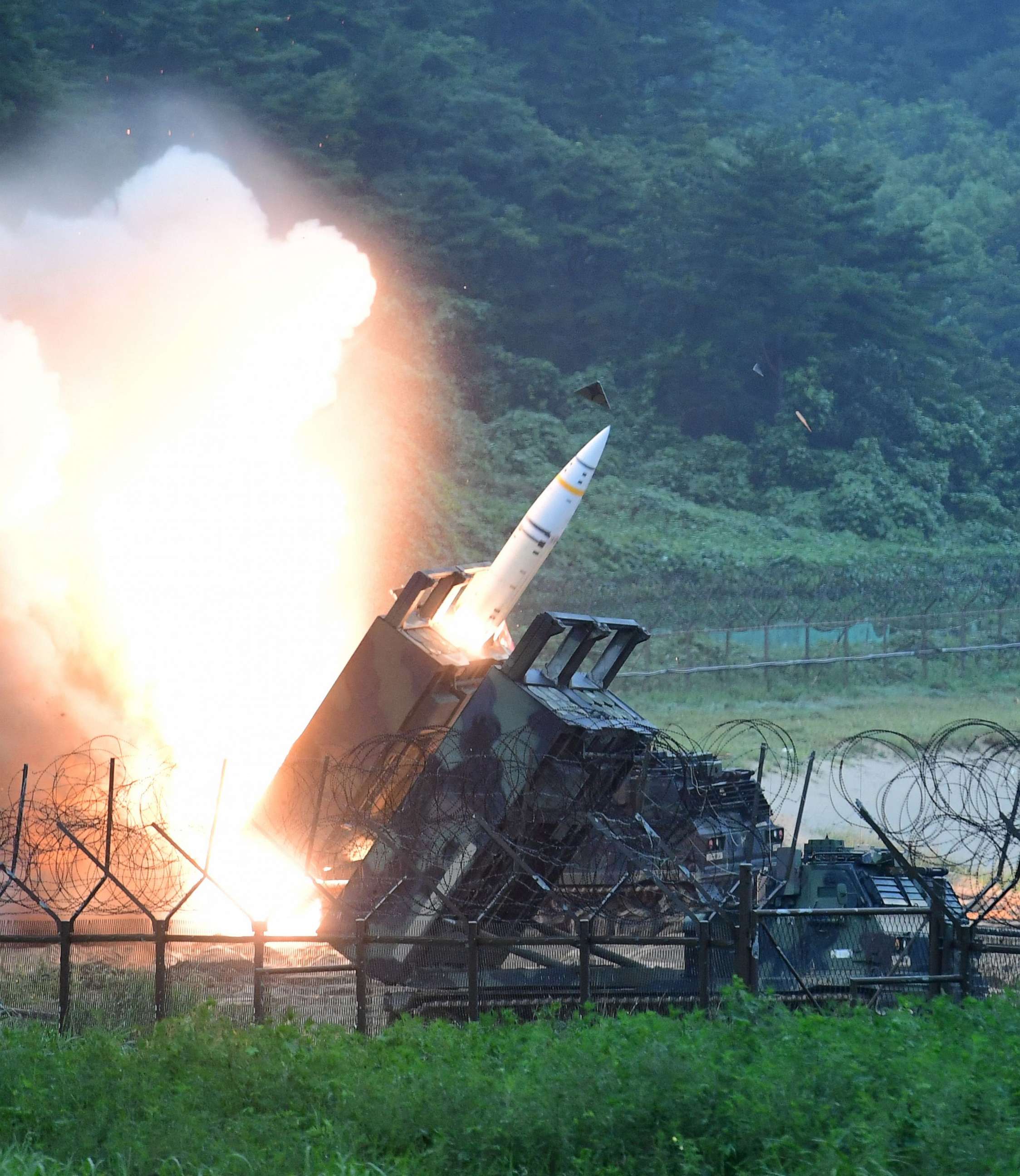 PHOTO: This handout photo taken on July 29, 2017, and provided by South Korean Defence Ministry in Seoul shows Army Tactical Missile System (ATACMS) firing a missile into the East Sea during a South Korea-U.S. joint missile drill.