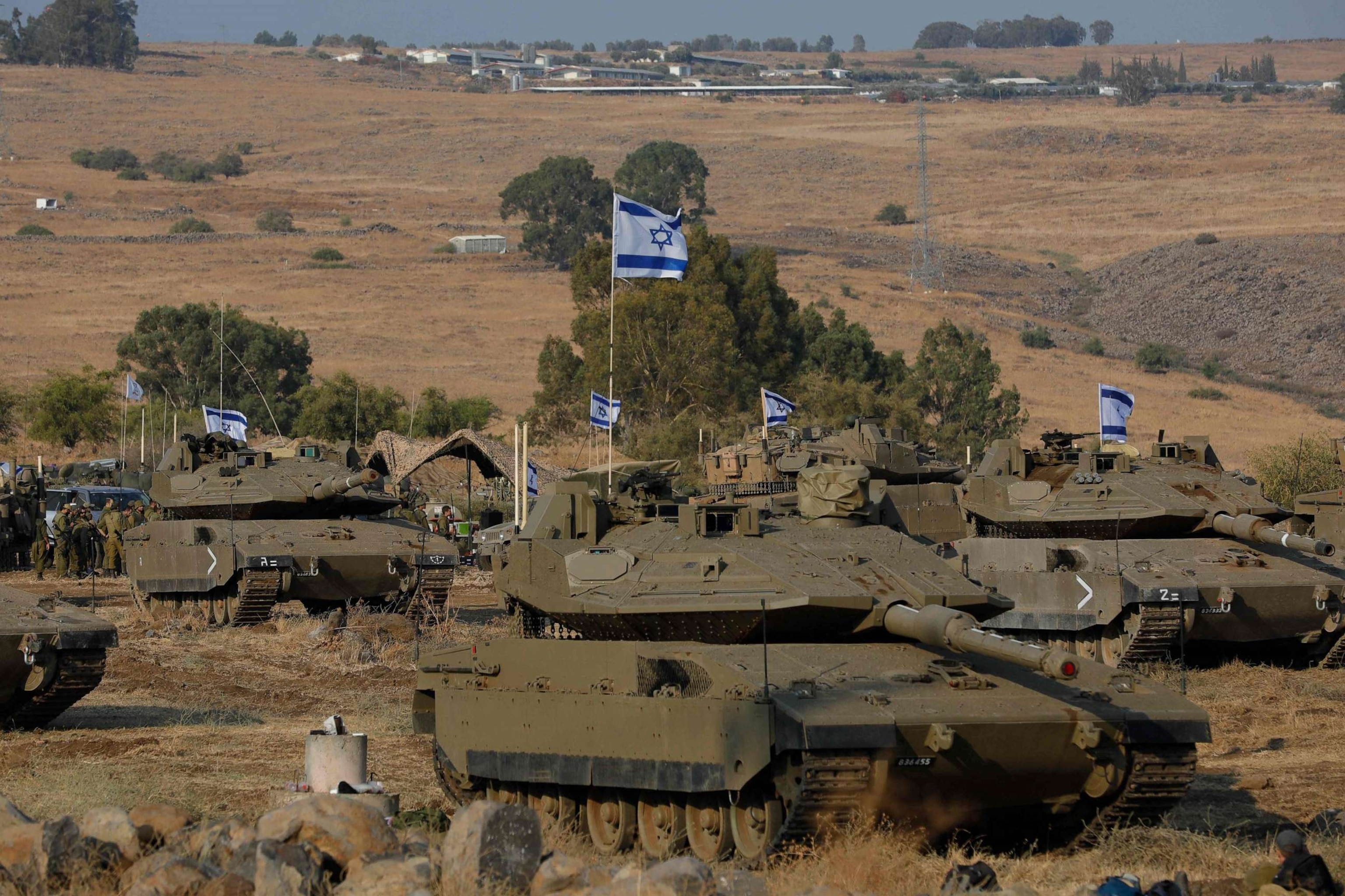 PHOTO: Israeli Merkava tanks are positioned in the upper Galilee in northern Israel near the border with Lebanon on Oct. 11, 2023. Images)