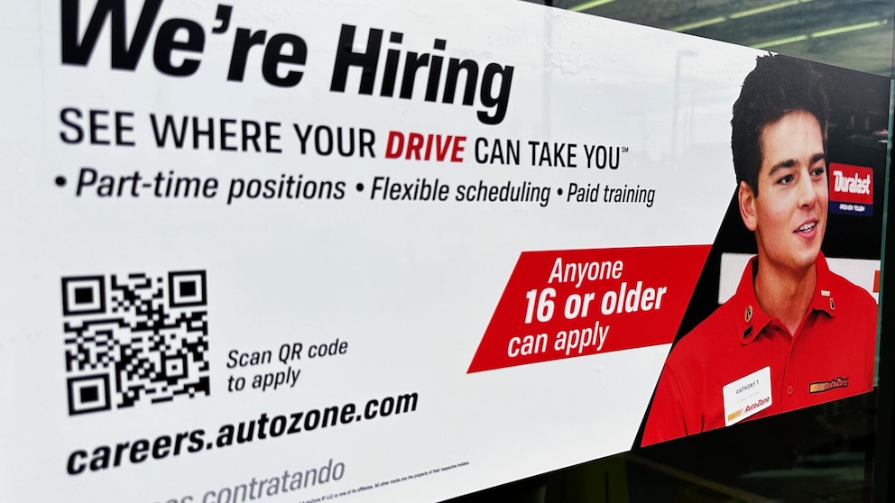 A hiring sign is displayed at a retail store in Wheeling, Ill., Sunday, Sept. 24, 2023. On Thursday, the Labor Department reports on the number of people who applied for unemployment benefits last week. (AP Photo/Nam Y. Huh)