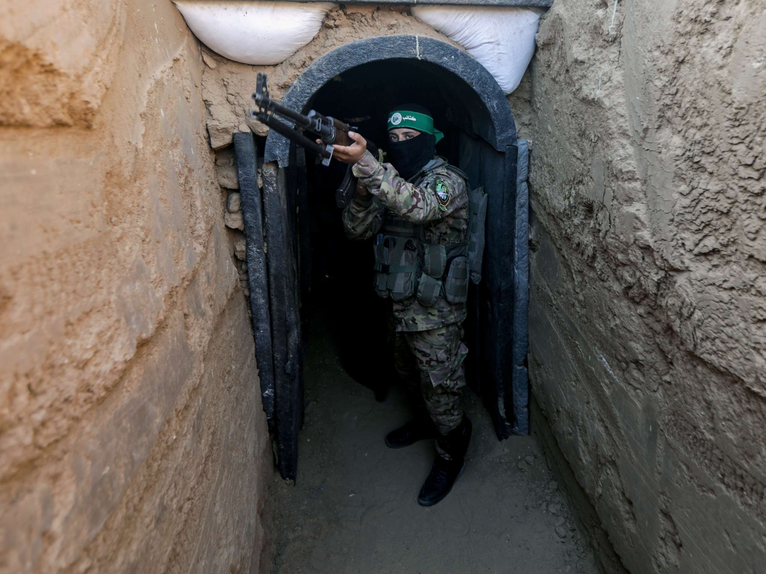 PHOTO: A fighter from Izz al-Din al-Qassam, the military wing of Hamas in the Maghazi camp, stands in front of a tunnel in the central Gaza Strip, July 19, 2023.