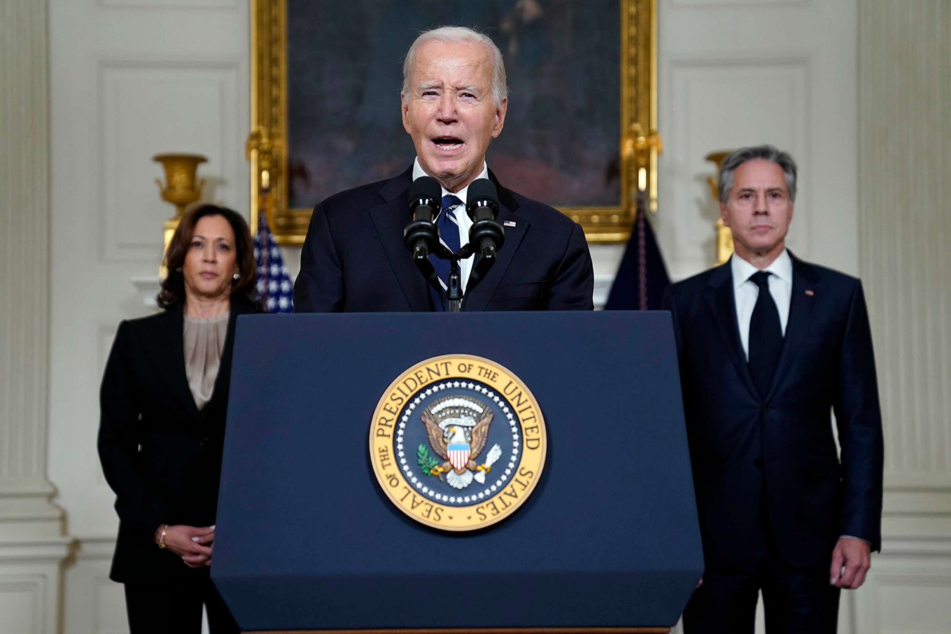 PHOTO: President Joe Biden speaks, Oct. 10, 2023, in the State Dining Room of the White House in Washington, about the war between Israel and the militant Palestinian group Hamas, as Vice President Kamala Harris and Secretary of State Antony Blinken liste