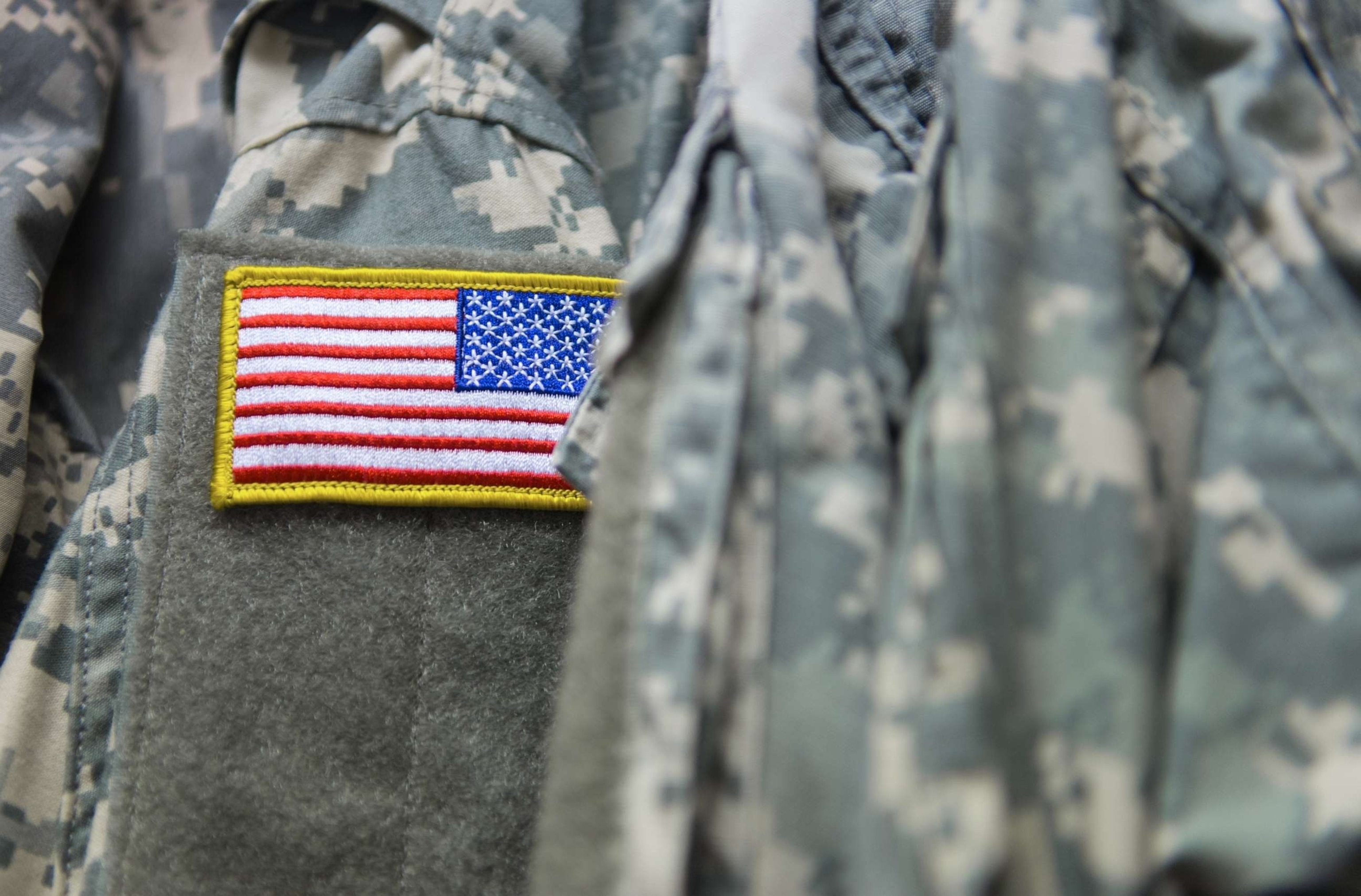 PHOTO: An American flag on the shoulder of Army uniform.