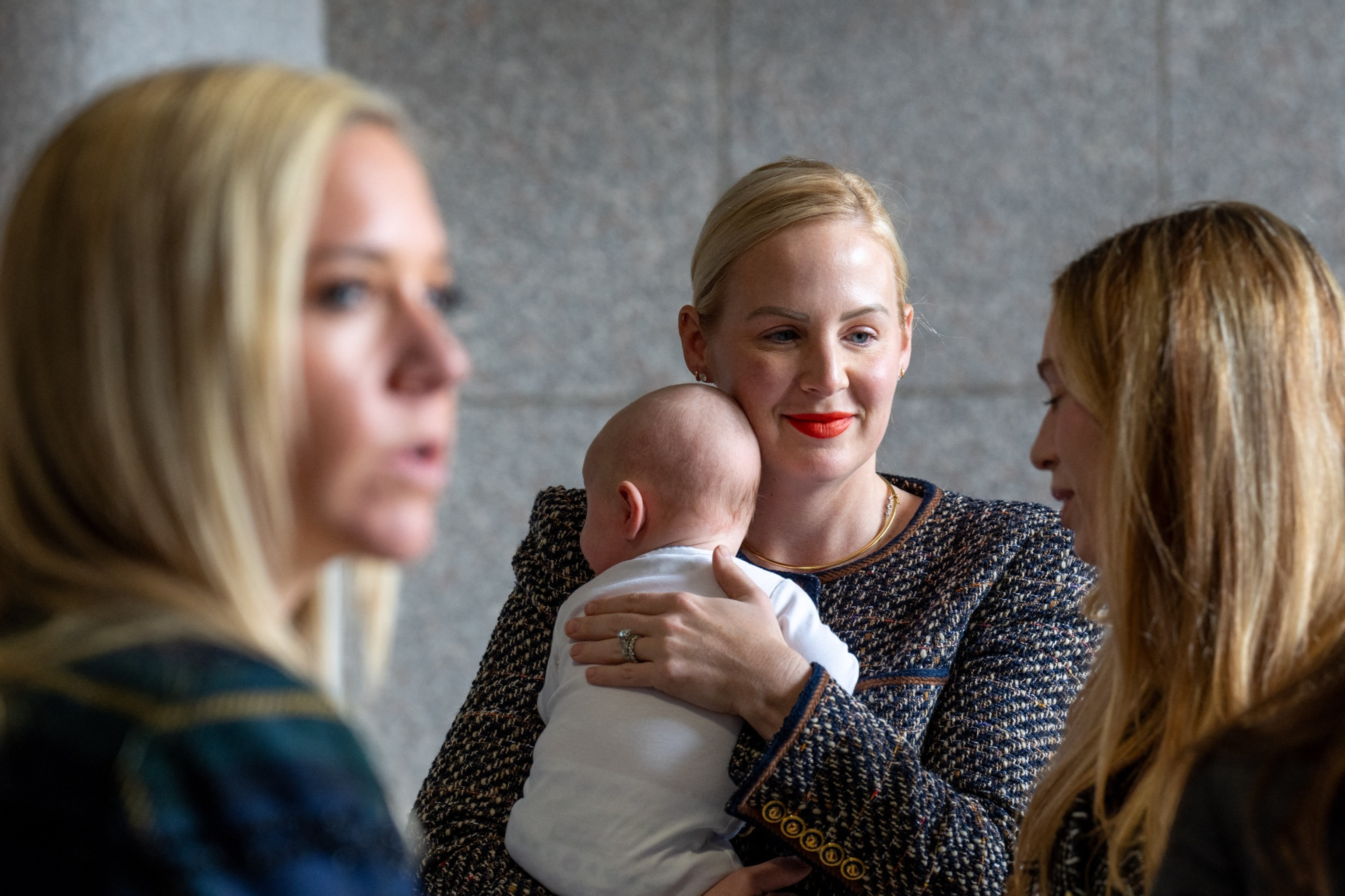 PHOTO: Amanda Zurowski, Dr. Austin Dennard, and Taylor Edwards prepare to enter the court room at the Texas Supreme Court in Austin, Texas, on Nov. 28, 2023.