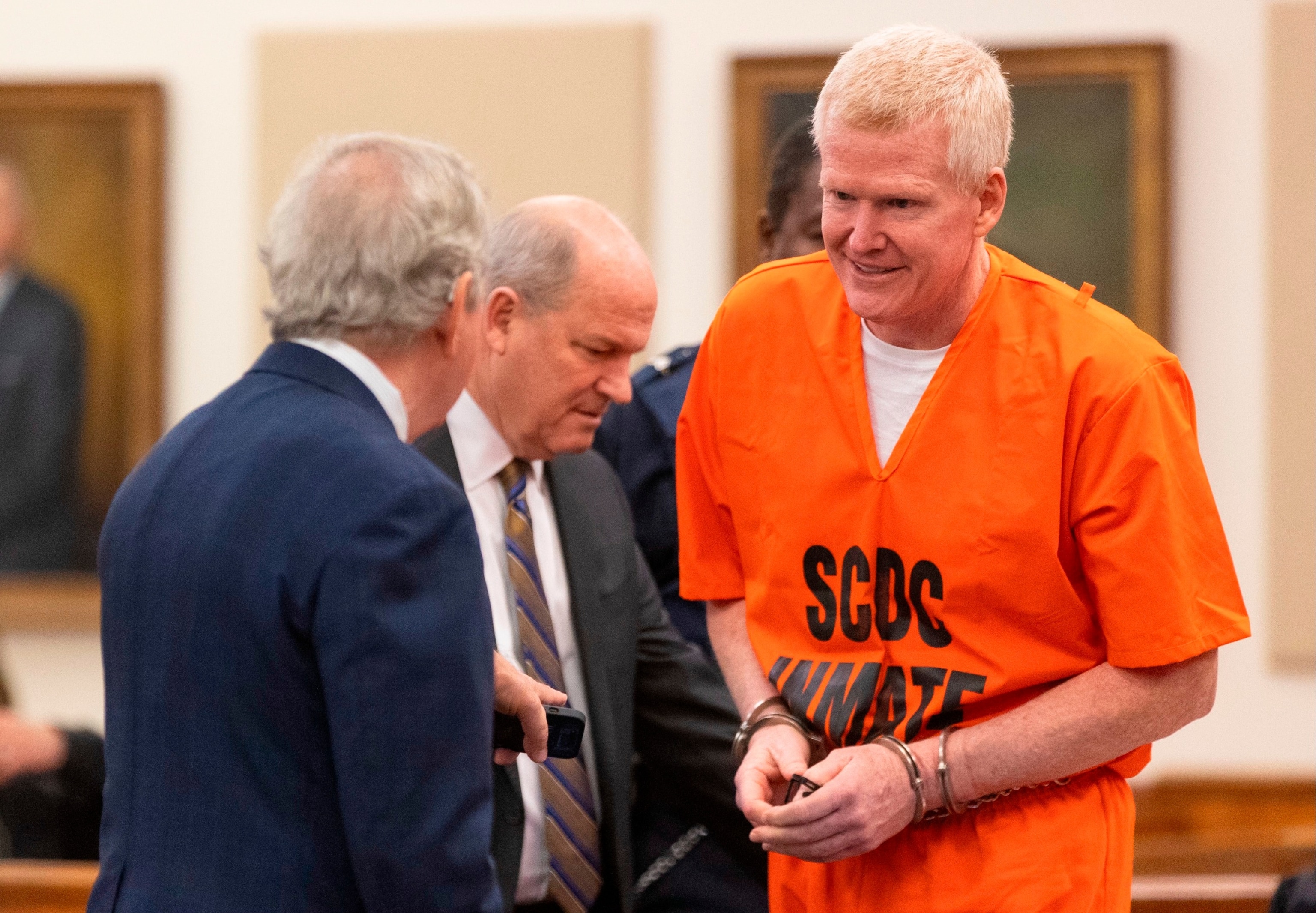 PHOTO: Alex Murdaugh talks with his attorneys Dick Harpootlian, left, and Jim Griffin during his sentencing for stealing from clients, Nov. 28, 2023, at the Beaufort County Courthouse in Beaufort, S.C. 