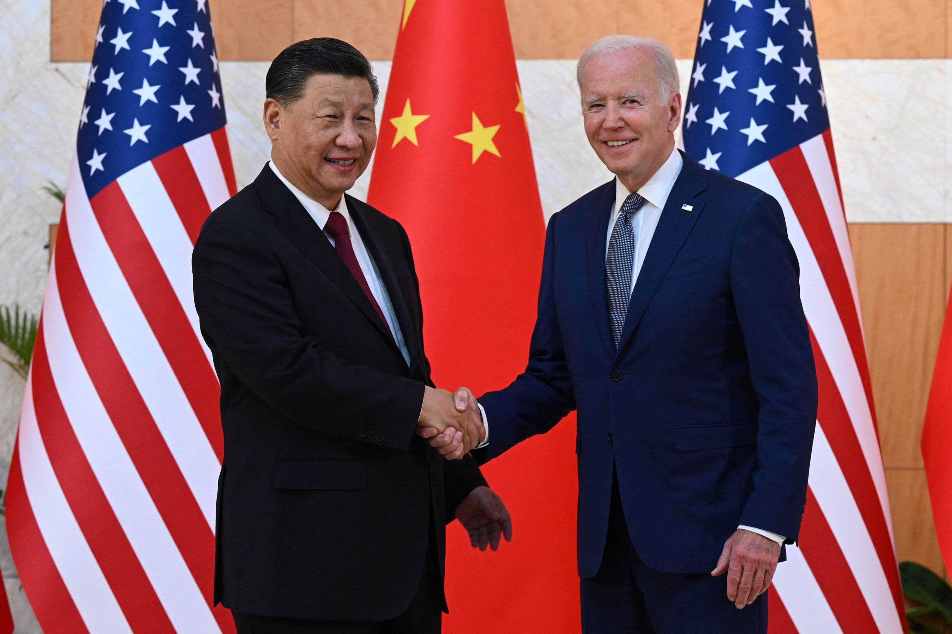 PHOTO: President Joe Biden and China's President Xi Jinping shake hands as they meet on the sidelines of the G20 Summit in Nusa Dua on the Indonesian resort island of Bali on Nov. 14, 2022. 