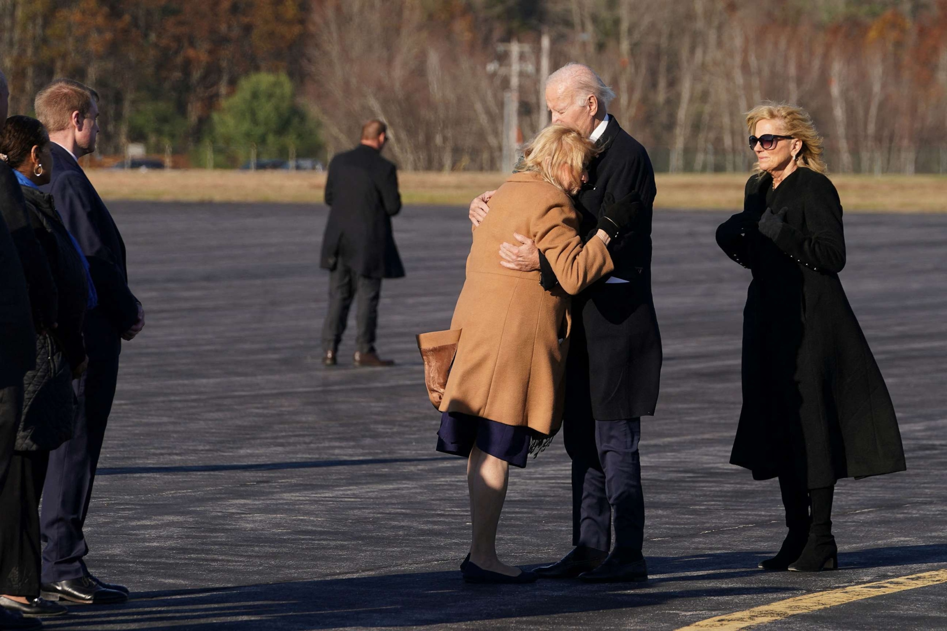 PHOTO: President Joe Biden embraces Maine Governor Janet Mills, en route to Lewiston to pay respects to the victims of the mass shootings, at an airport in Auburn, Maine, on Nov. 3, 2023.