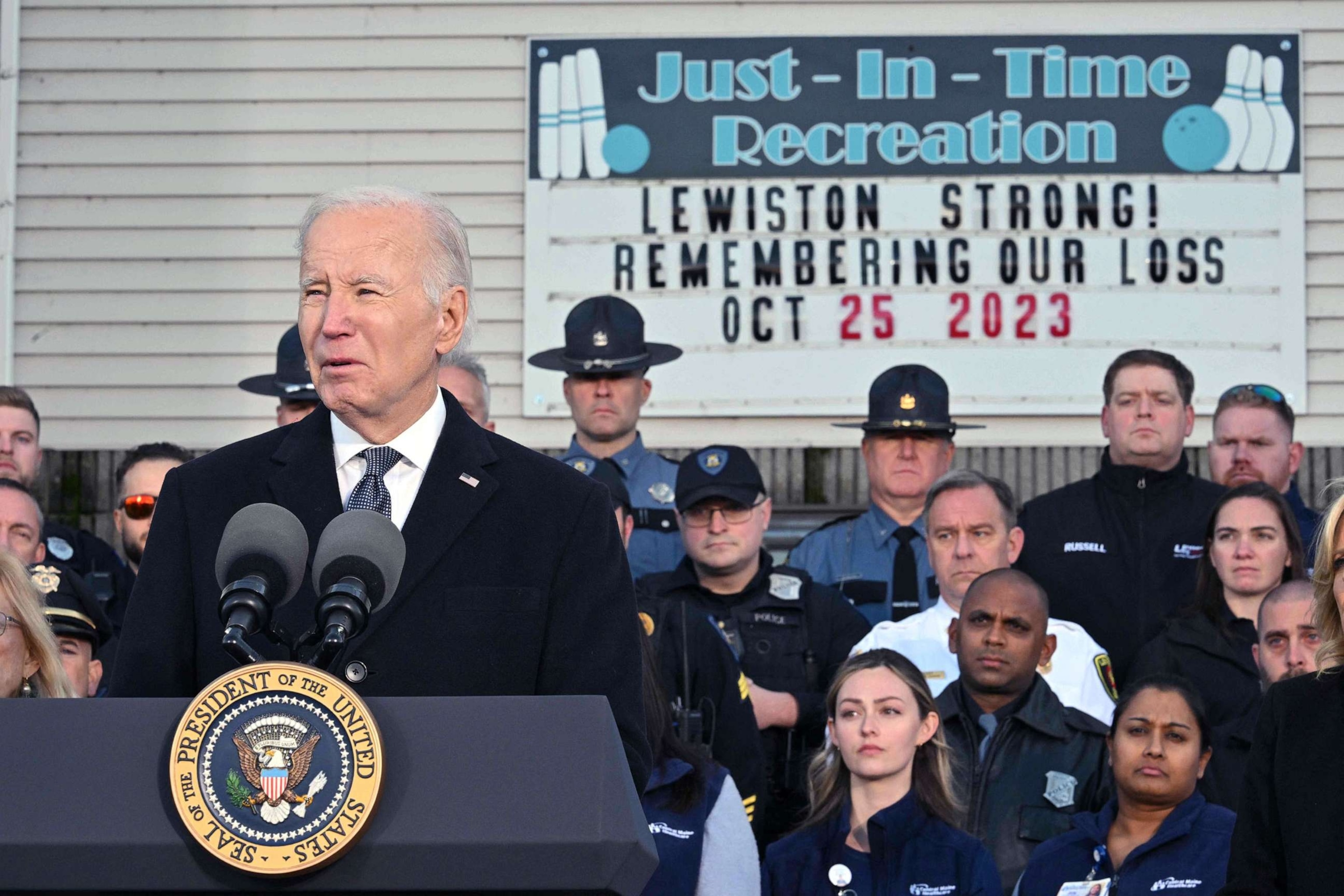 PHOTO: President Joe Biden speaks surrounded by first responders, nurses, and others on the front lines of the response to the Oct. 25, 2023, mass shooting in Lewinston, Maine, on Nov. 3, 2023.