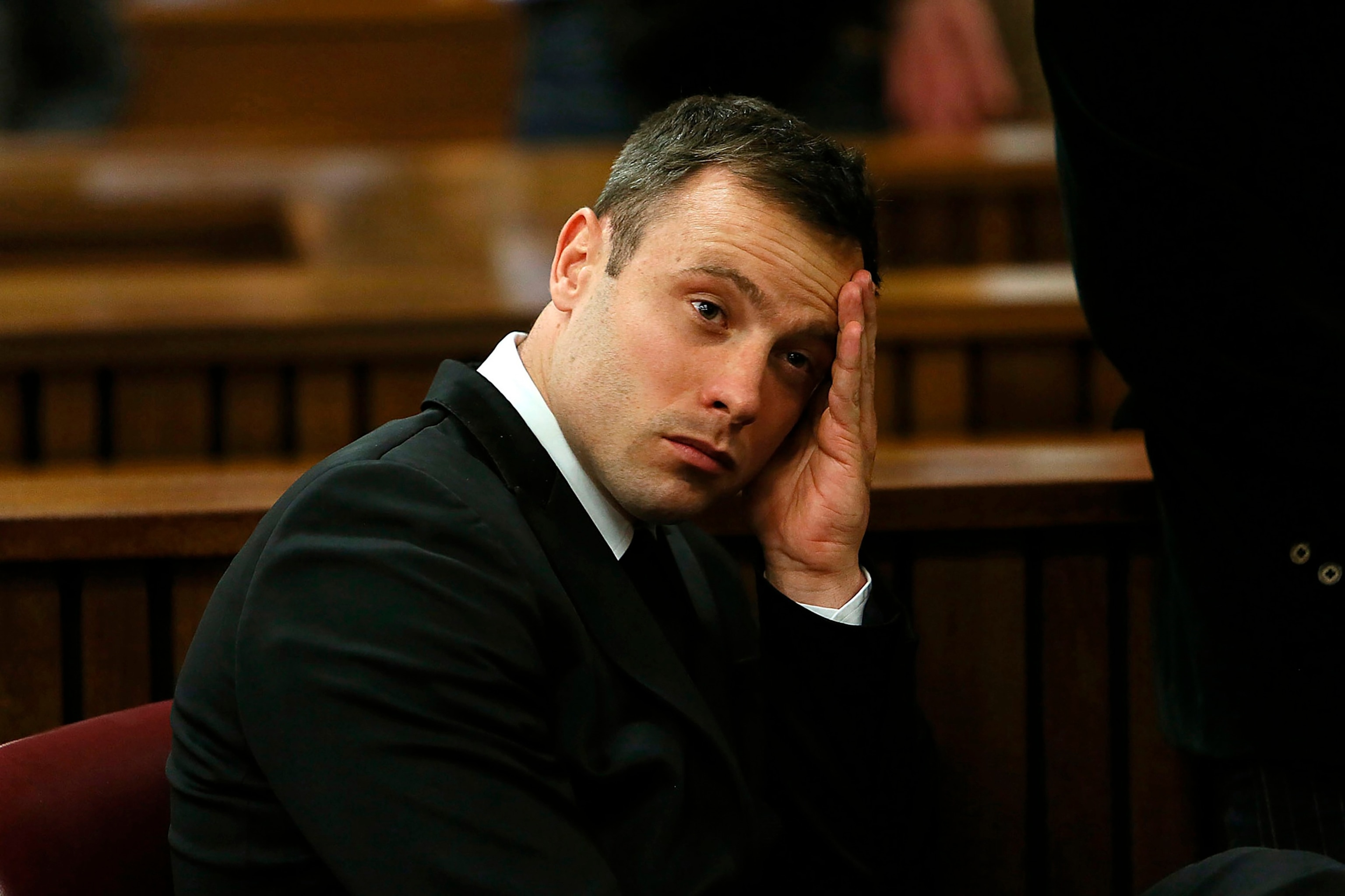 PHOTO: Oscar Pistorius gestures at the end of the fourth day of sentencing proceedings in Pretoria, South Africa, Oct. 16, 2014. Pistorius has a second chance at parole Nov. 24, 2023, after he was wrongly ruled ineligible for release from jail in March.