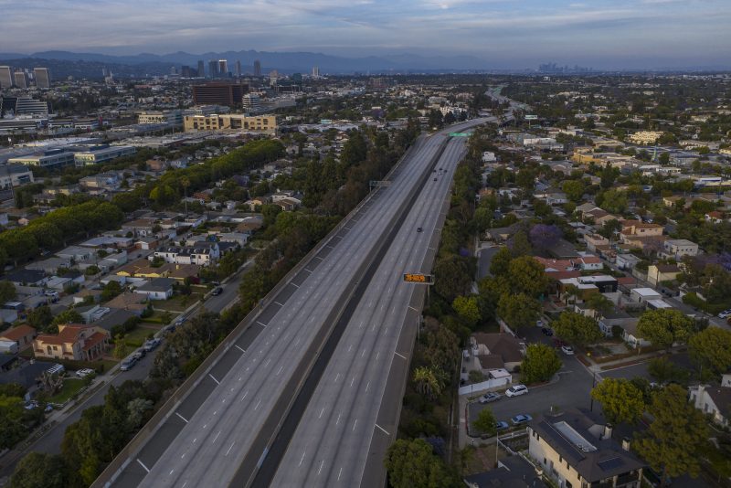 SANTA MONICA, CALIFORNIA - MAY 31: A drone aerial view shows an empty Interstate 10 freeway after all westbound traffic toward Santa Monica was shut down due to rioting and an emergency curfew during demonstrations on May 31, 2020 Santa Monica, California. The vast majority of protesters demonstrated peacefully. Former Minneapolis police officer Derek Chauvin was taken into custody for Floyd's death. Chauvin has been accused of kneeling on Floyd's neck as he pleaded with him about not being able to breathe. Floyd was pronounced dead a short while later. Chauvin and 3 other officers, who were involved in the arrest, were fired from the police department after a video of the arrest was circulated. (Photo by David McNew/Getty Images)