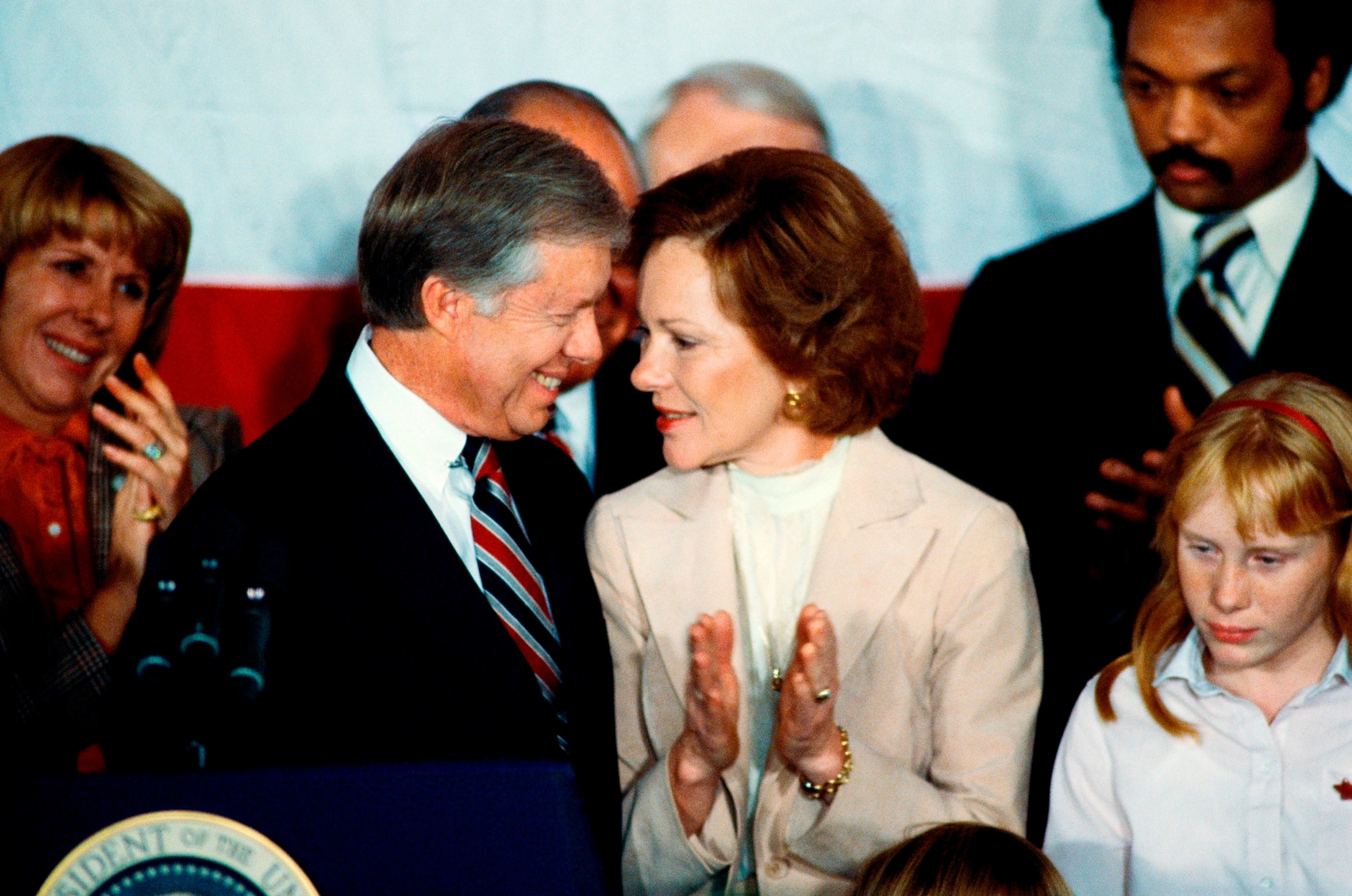 PHOTO: President Jimmy Carter is applauded by First Lady Rosalynn Carter and supporters after conceding defeat to Reagan during the 1980 presidential election, Nov 4, 1980.