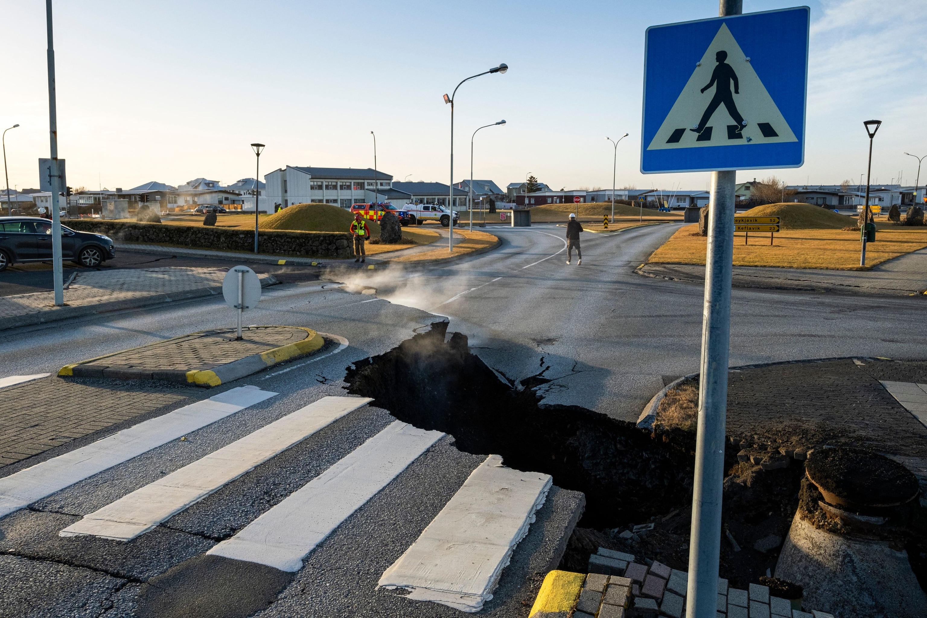 PHOTO: This photo taken on Nov. 13, 2023 shows a crack cutting across the main road in Grindavik, southwestern Iceland following earthquakes. 