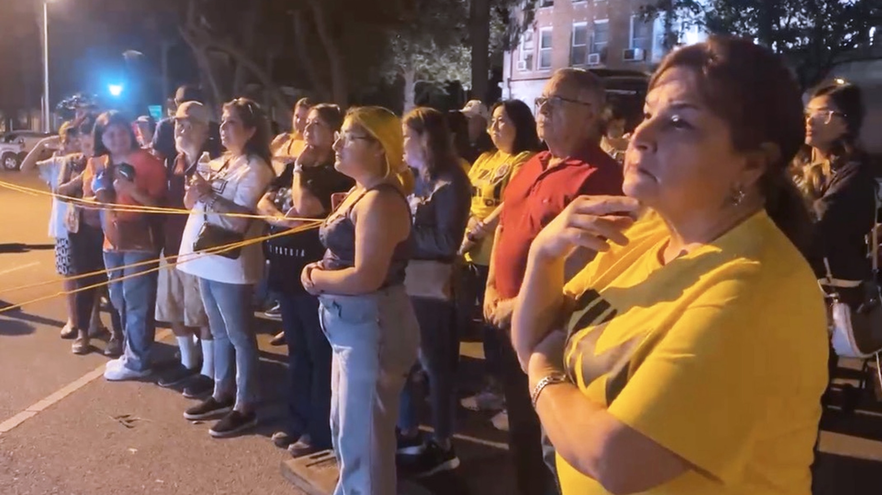 PHOTO: Community members await the mayoral election results outside the Uvalde Leader-News in Uvalde, Texas.