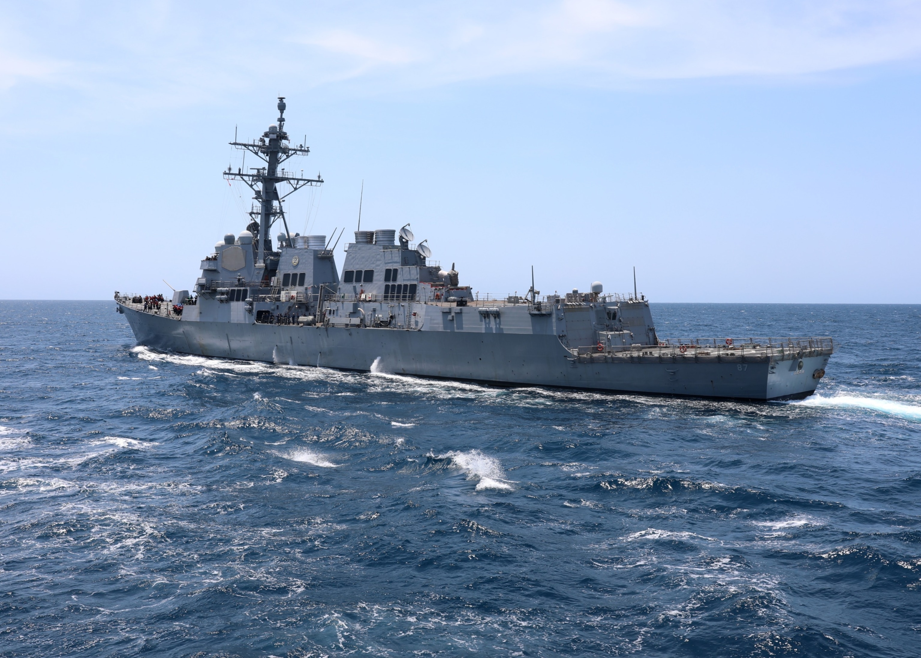 PHOTO: The guided-missile destroyer USS Mason (DDG 87) steams away from the fleet replenishment oiler USNS Joshua Humphreys (T-AO 188) after completing an underway replenishment-at-sea in the Atlantic Ocean, July 17, 2021.