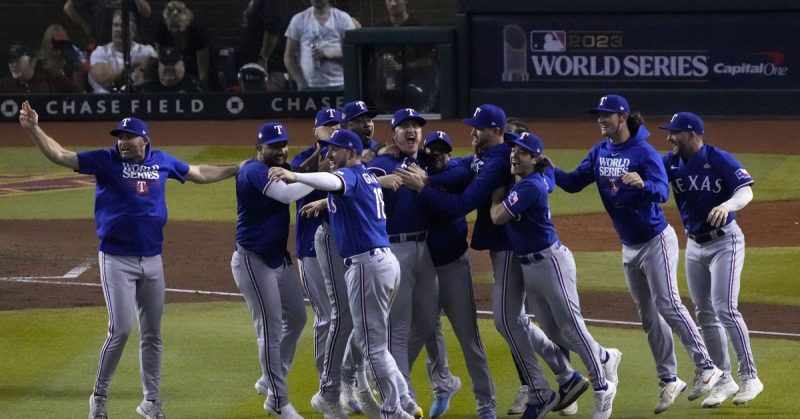 The Texas Rangers react after defeating the Arizona Diamondbacks in game five of the 2023 World Series at Chase Field. Mandatory Credit: Rick Scuteri-USA TODAY Sports