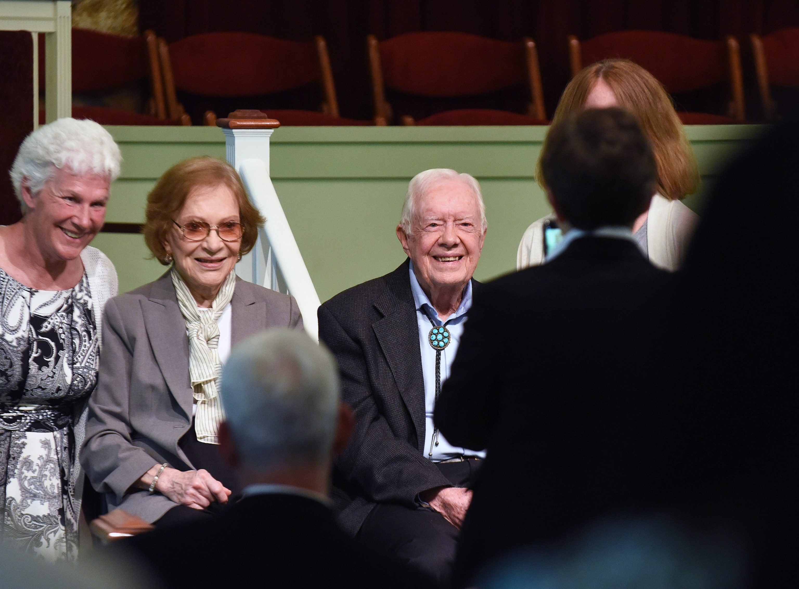 PHOTO: Former President Jimmy Carter and his wife, Rosalynn Carter, pose for a photograph with church attendees at Maranatha Baptist Church after Carter taught Sunday school in his hometown of Plains, Ga., April 28, 2019. 