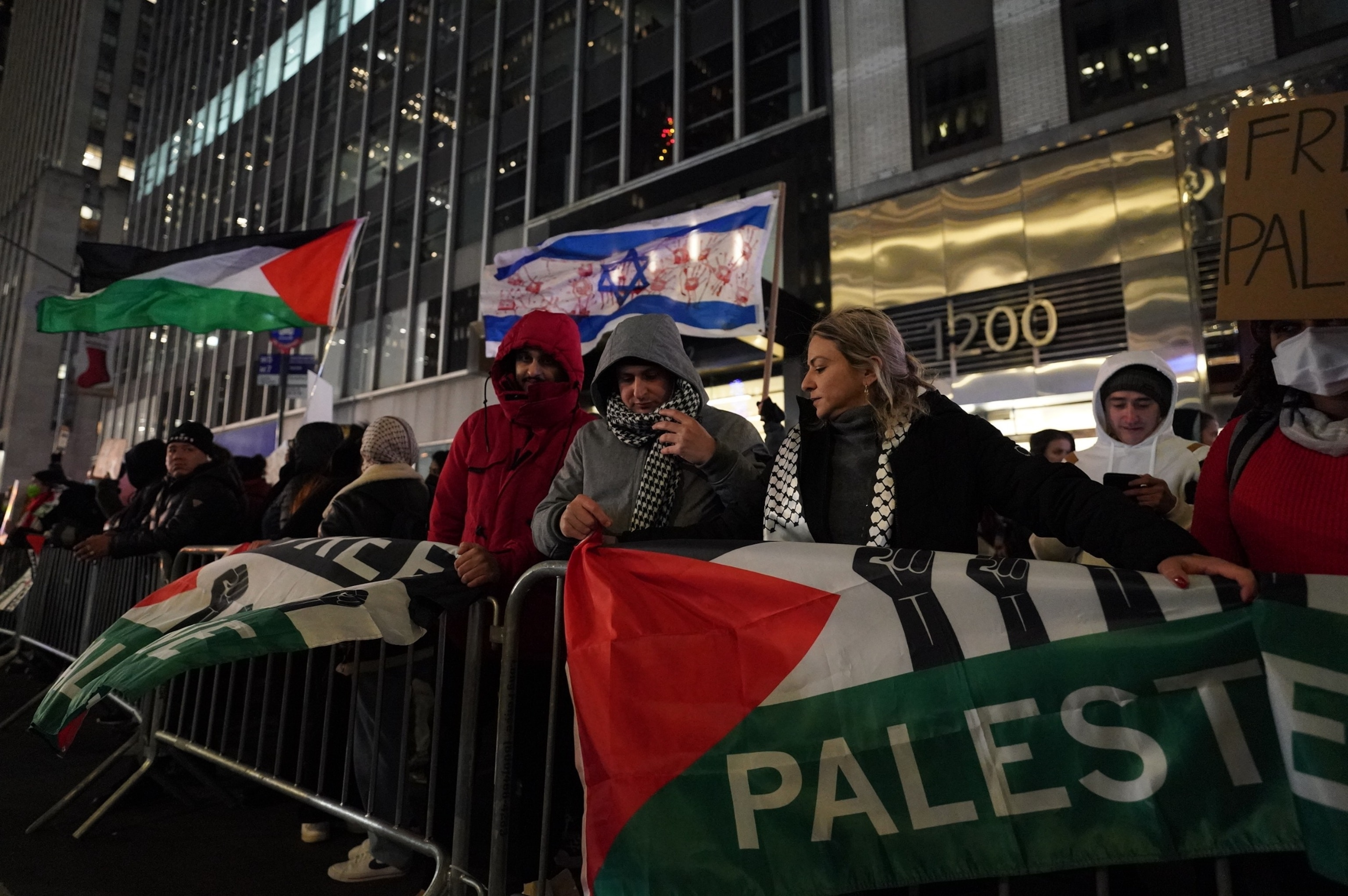 PHOTO: Pro-Palestine supporters gather for a rally at the Rockefeller tree lighting, Nov. 29, 2023, in New York.