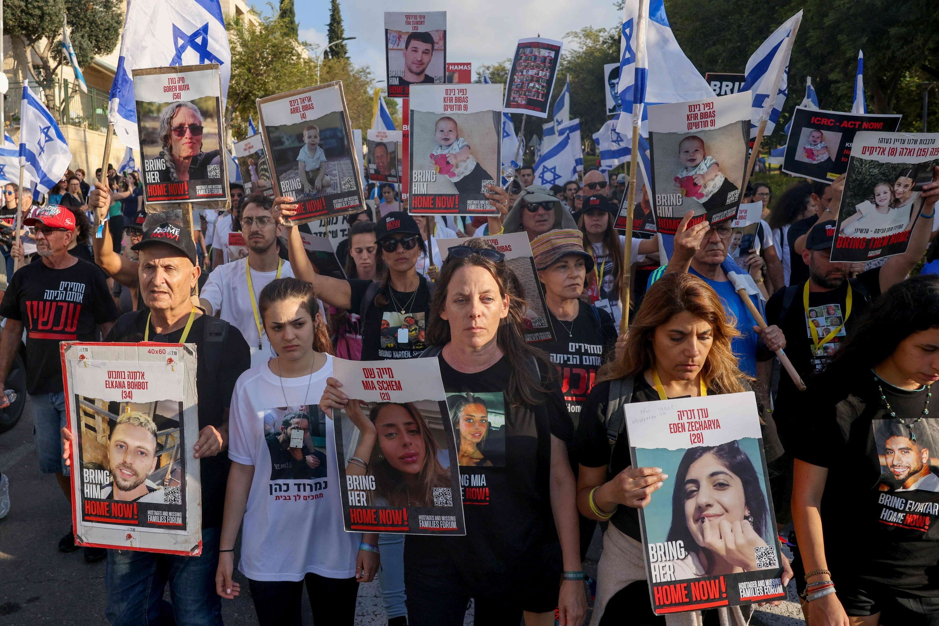 PHOTO: Relatives and friends of Israeli hostages held in Gaza since the October 7 attack by Hamas militants in southern Israel, hold placards and images of those taken during a protest for their release in the central city of Modiin, Nov. 16, 2023.