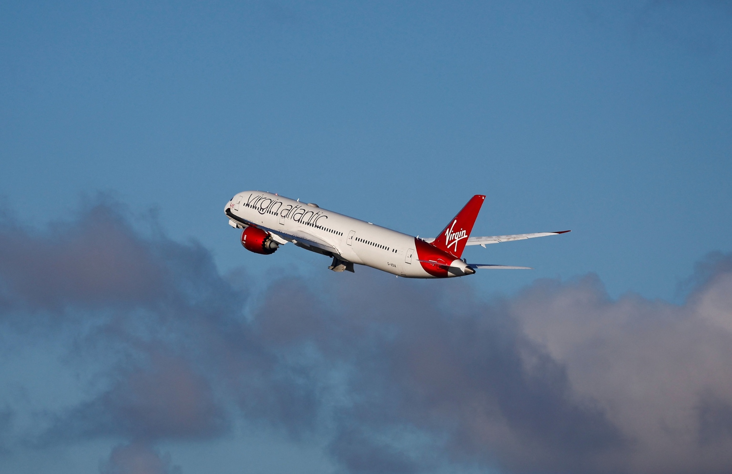 PHOTO: A Virgin Atlantic Boeing 787, performing the first 100% Sustainable Aviation Fuel transatlantic flight to John F. Kennedy International Airport in New York, takes off from Heathrow airport on Nov. 28, 2023 in London.