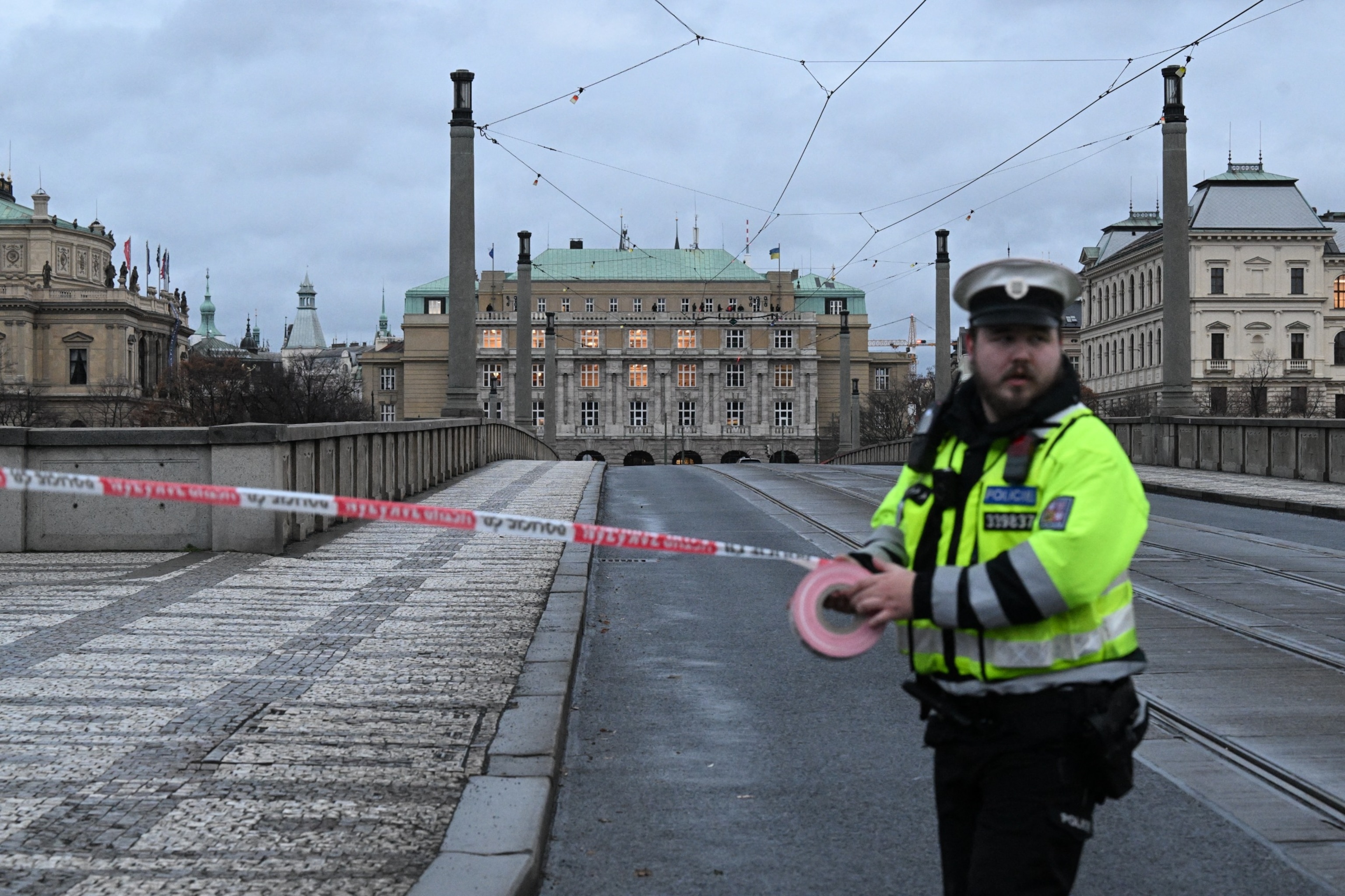 PHOTO: A police officer cordon off an area near the university in central Prague, Dec. 21, 2023. 