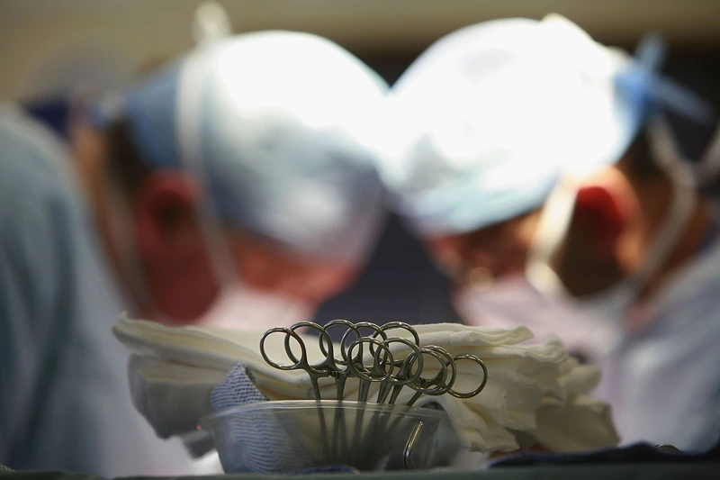 NHS Healthcare Organisation Looks To The Future
BIRMINGHAM, UNITED KINGDOM - JUNE 14: Surgeons at The Queen Elizabeth Hospital Birmingham conduct an operation on June 14, 2006, Birmingham, England. Senior managers of the NHS have said that the organisation needs to become more open in the future. (Photo by Christopher Furlong/Getty Images)