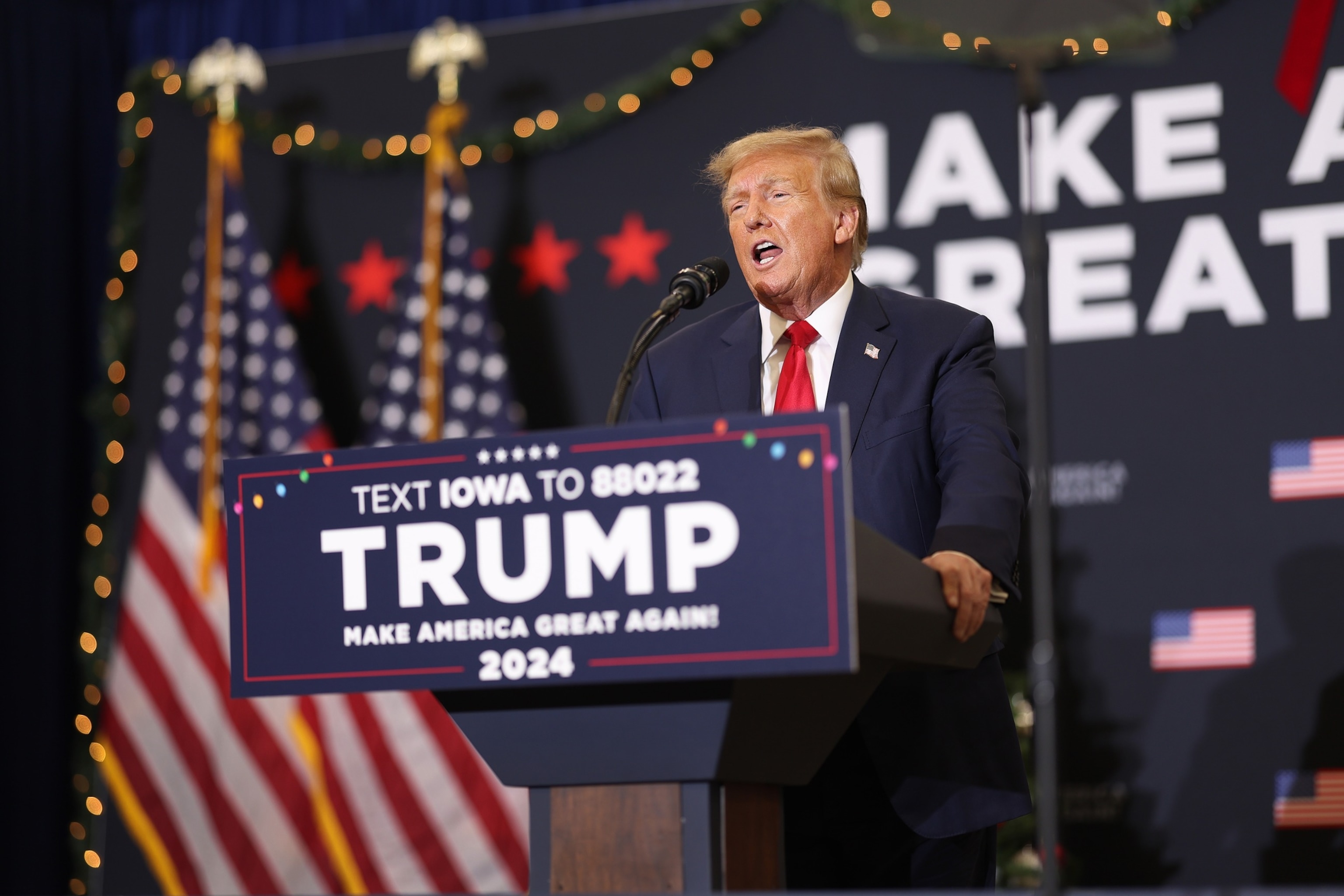 PHOTO: Republican presidential candidate and former President Donald Trump speaks to guests at a campaign event, on Dec. 19, 2023, in Waterloo, Iowa.