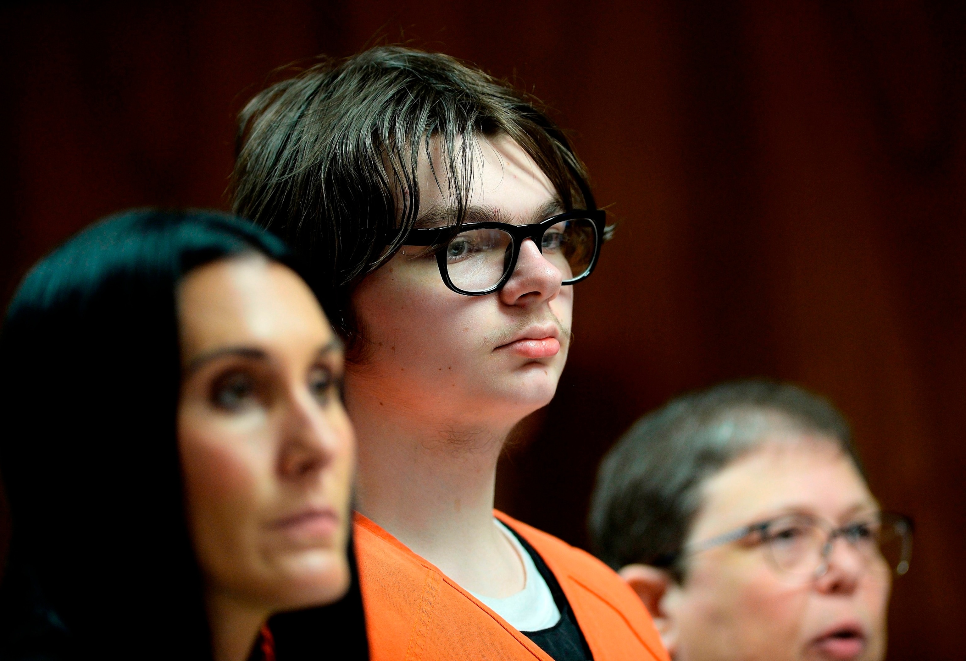 PHOTO: Ethan Crumbley stands with his attorneys, Paulette Loftin and Amy Hopp, during his hearing at Oakland County Circuit Court, Aug. 1, 2023, in Pontiac, Mich. 