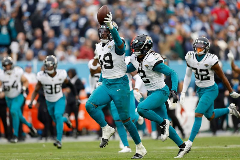 NASHVILLE, TENNESSEE - DECEMBER 11: Arden Key #49 of the Jacksonville Jaguars celebrates after recovering a fumble in the fourth quarter of the game against the Tennessee Titans at Nissan Stadium on December 11, 2022 in Nashville, Tennessee. (Photo by Wesley Hitt/Getty Images)