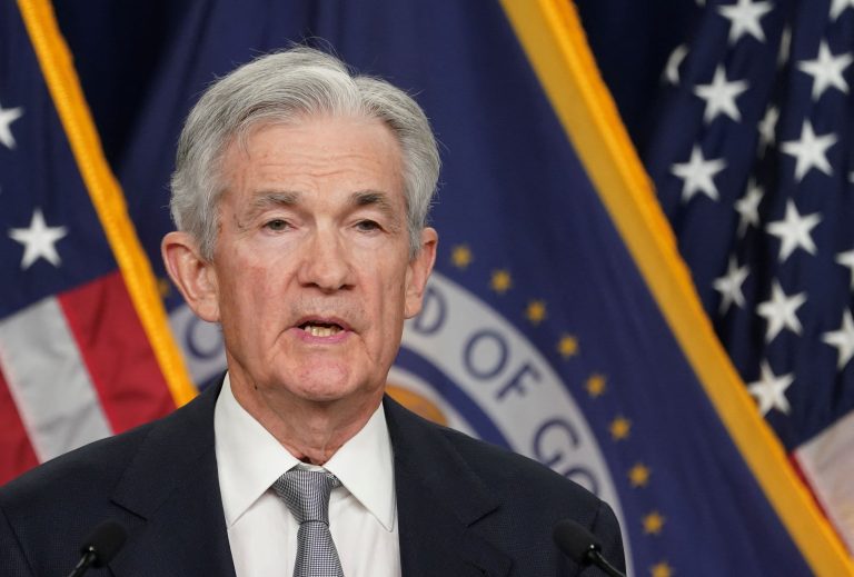 Fed holds rates steady, indicates three cuts coming in 2024