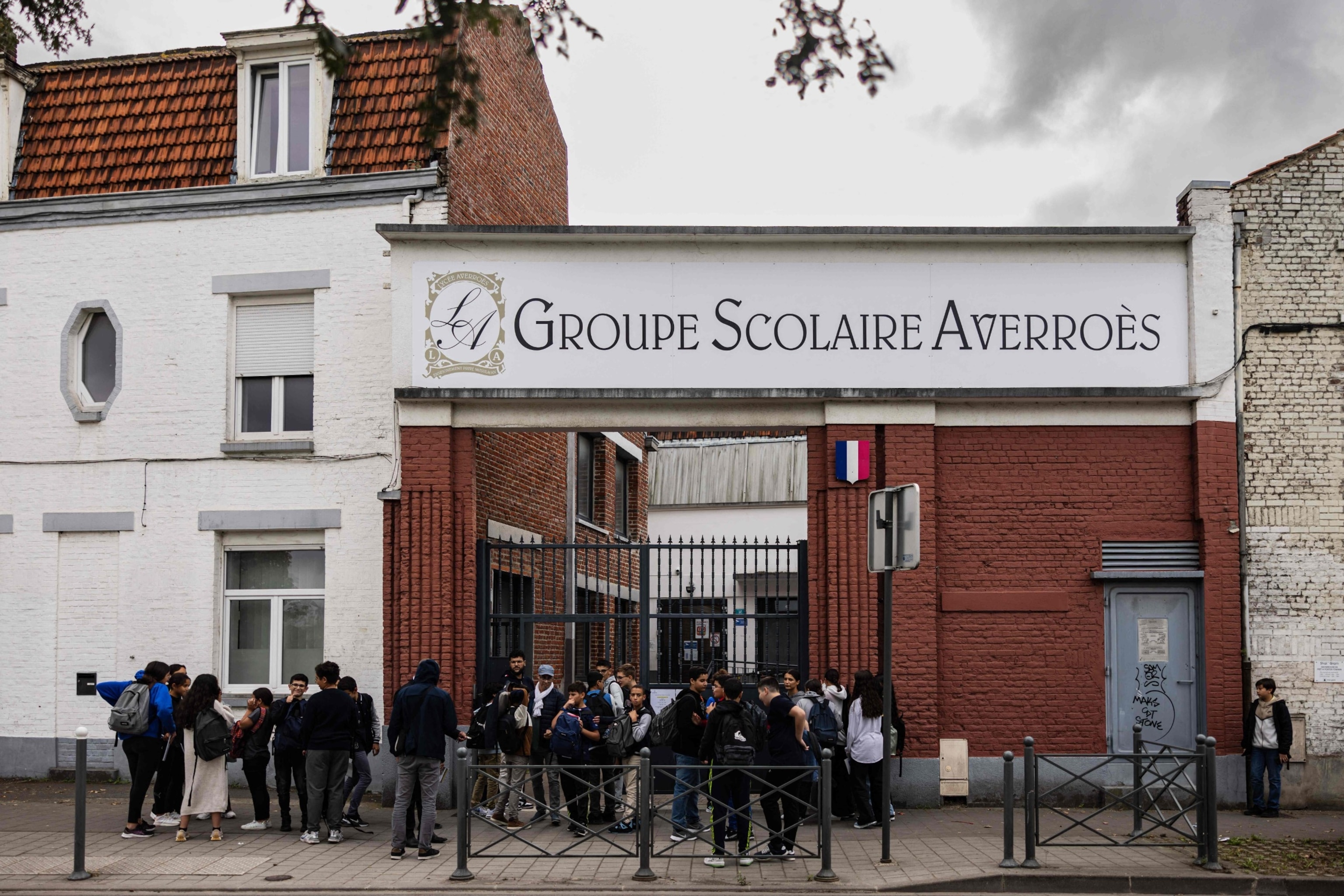 PHOTO: Students leave the Averroes high school in Lille, northern France on Sept. 28, 2023. 