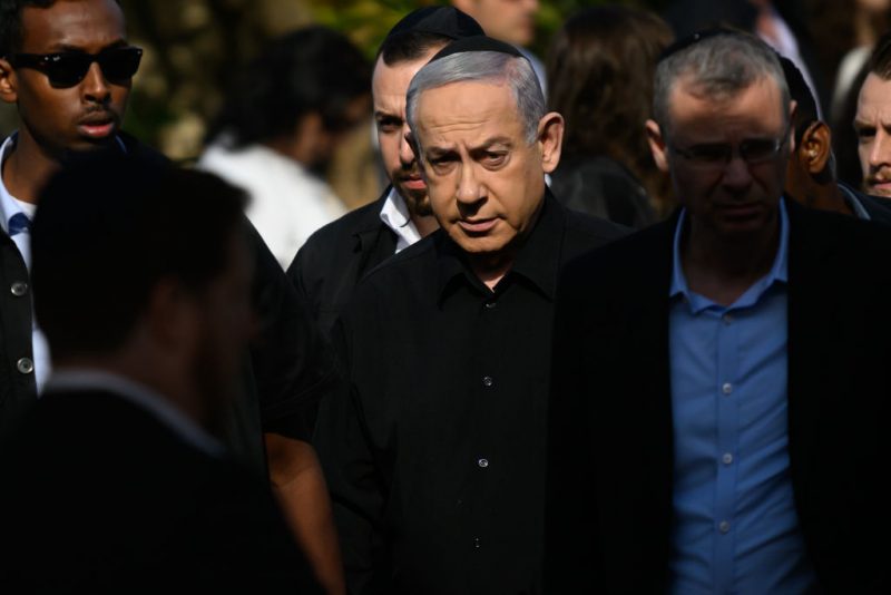 HERZLIYA, ISRAEL - DECEMBER 08: Prime Minister Benjamin Netanyhu attends the funeral for First Sergeant Major Gal Meir Eisenkot (aged 25) in the Herzliya cemetery on December 8, 2023 in Herzliya, Israel. The Israel Defense Forces said the 25-year-old major, son of the cabinet minister and former army chief Gadi Eisenkot, died on Thursday in Gaza. Over two months have passed since the Oct. 7 attacks by Hamas that sparked a retaliatory ground and air campaign by Israel in Gaza. (Photo by Alexi J. Rosenfeld/Getty Images)