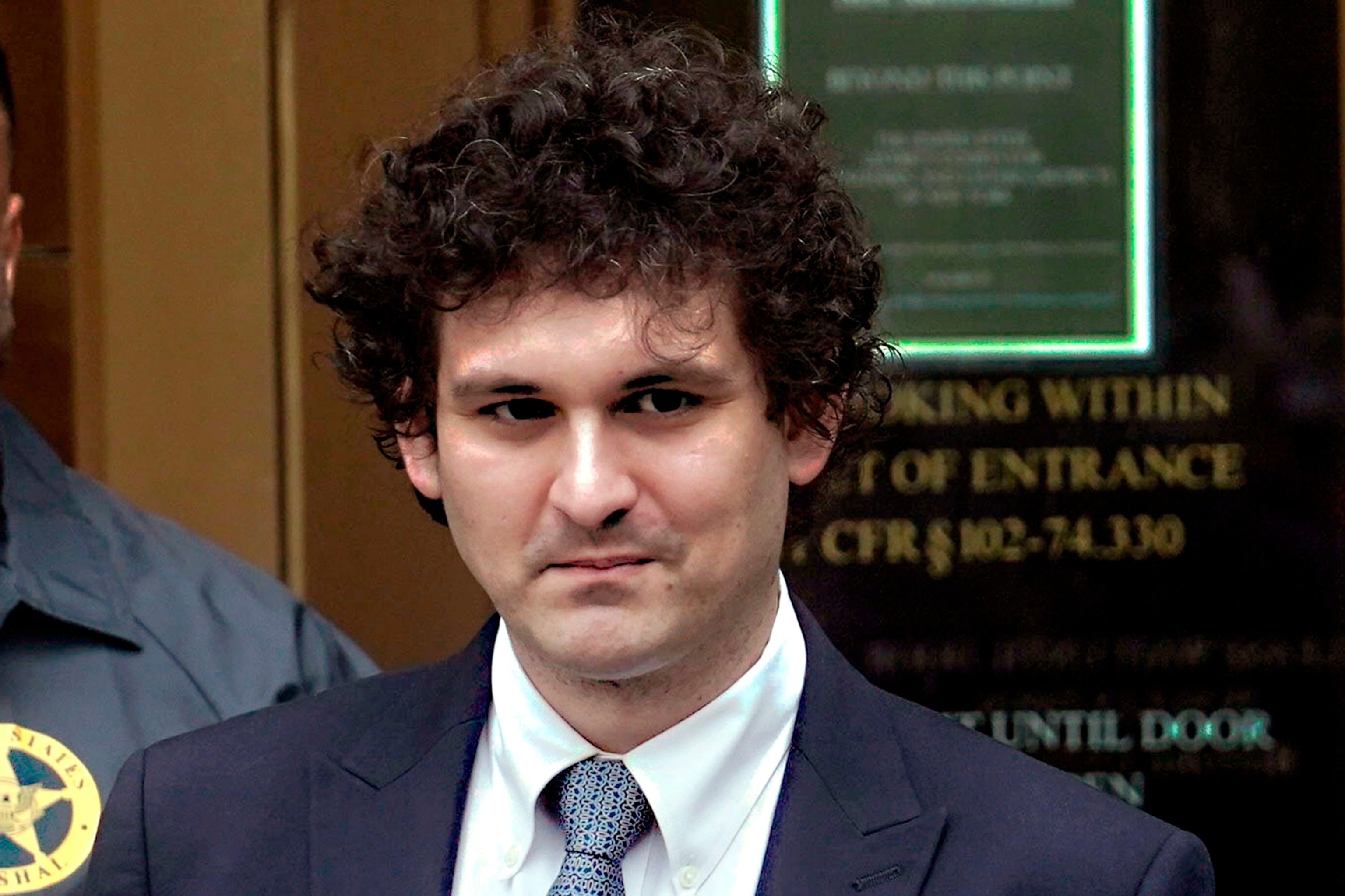 PHOTO: FTX founder Sam Bankman-Fried leaves Manhattan federal court, June 15, 2023, in New York. 