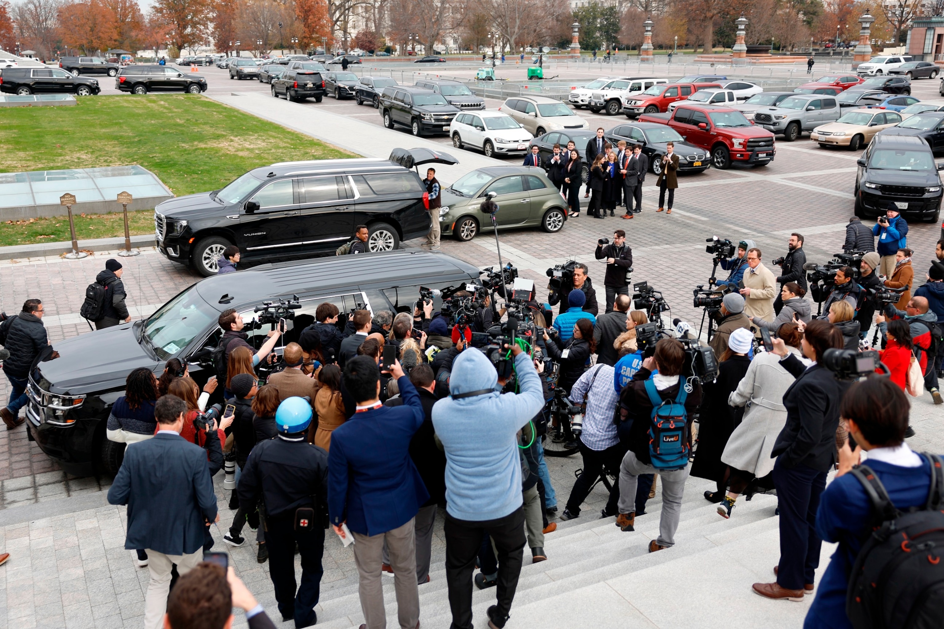 PHOTO: Rep. George Santos is surrounded by journalists as he leaves the U.S. Capitol after his fellow members of Congress voted to expel him from the House of Representatives on Dec. 1, 2023 in Washington, D. C.