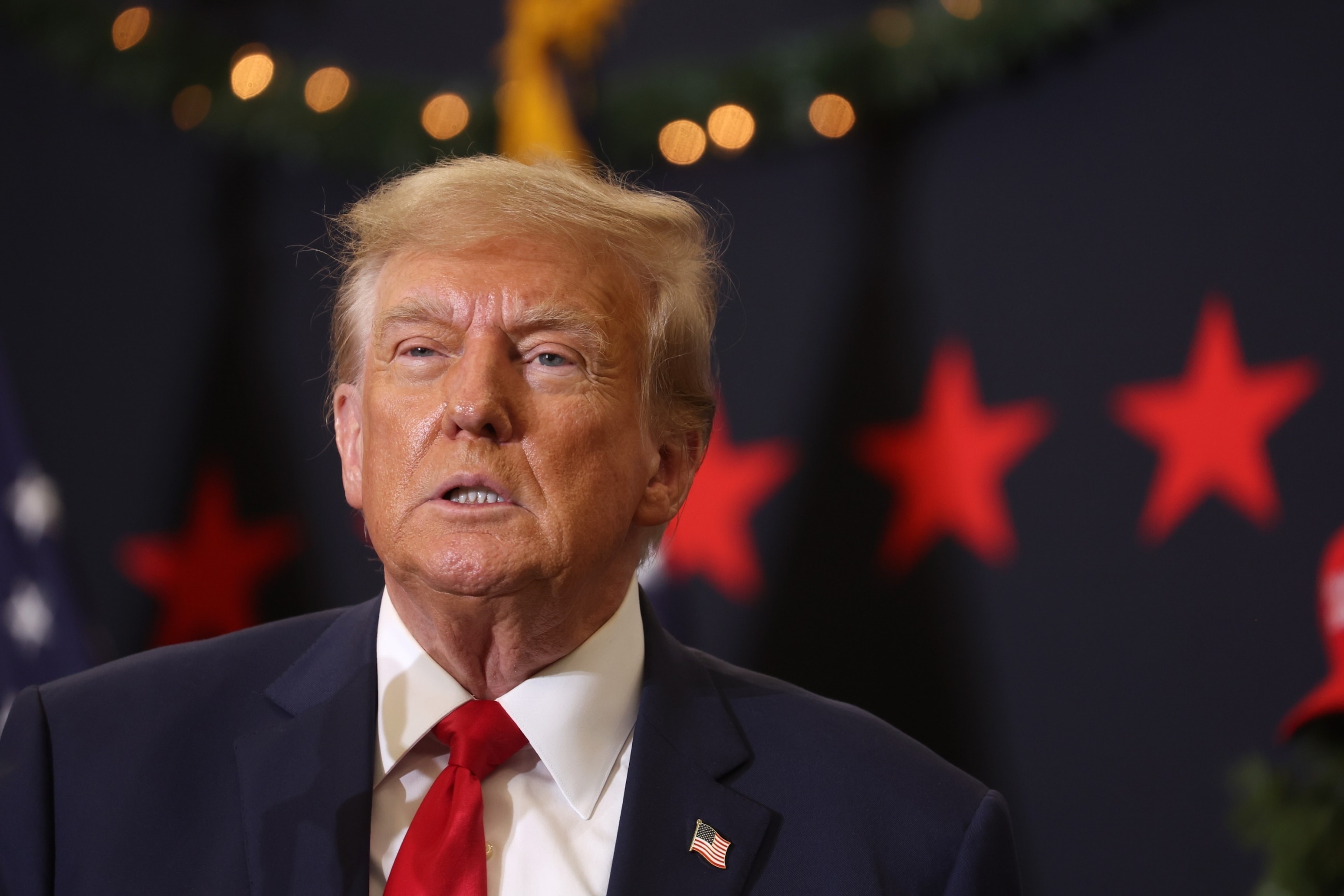 PHOTO: Republican presidential candidate and former President Donald Trump looks on during a campaign event on Dec. 19, 2023 in Waterloo, Iowa. 