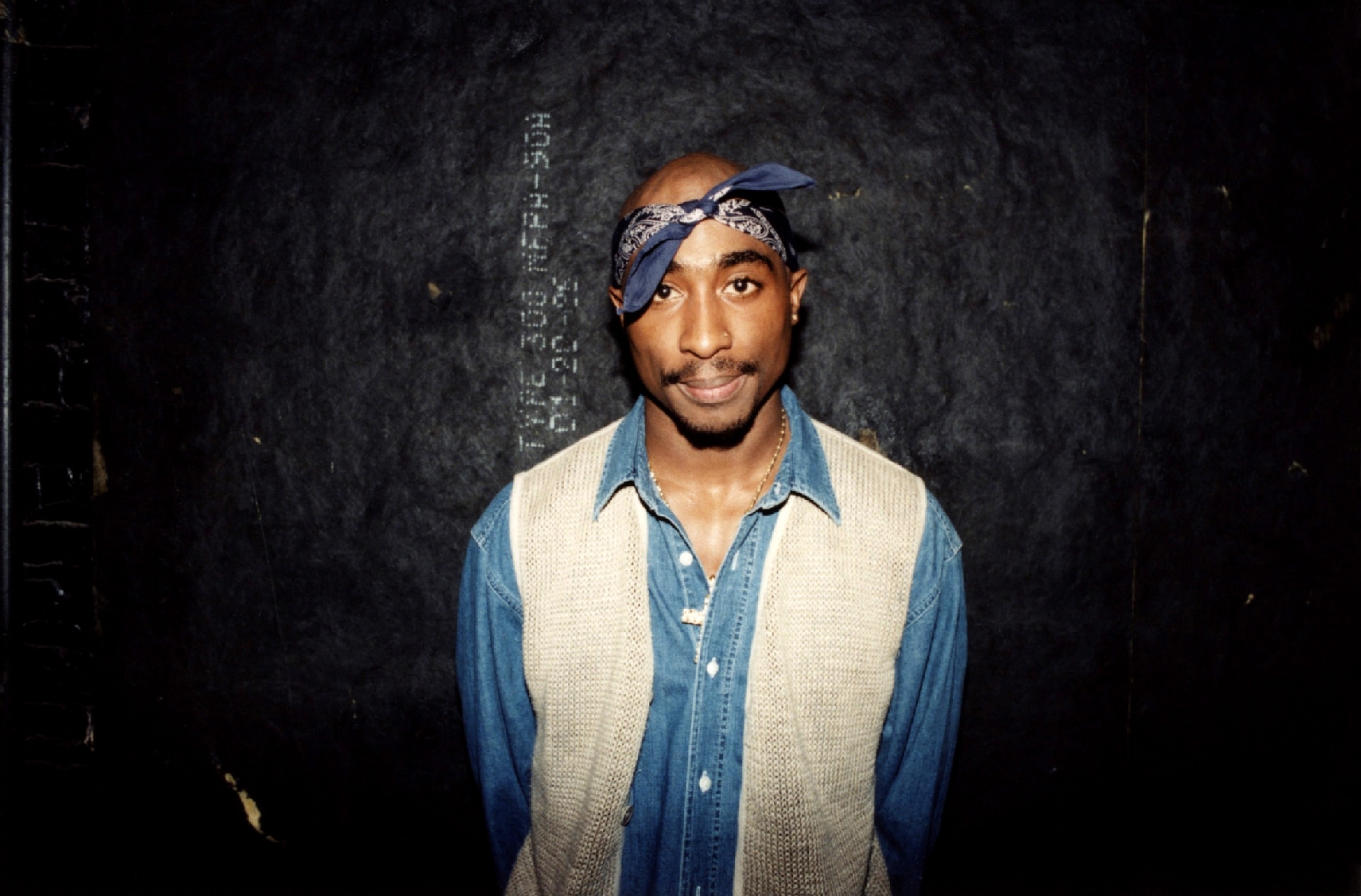 PHOTO: Tupac Shakur poses for photos backstage after his performance at the Regal Theater in Chicago, in March 1994. 