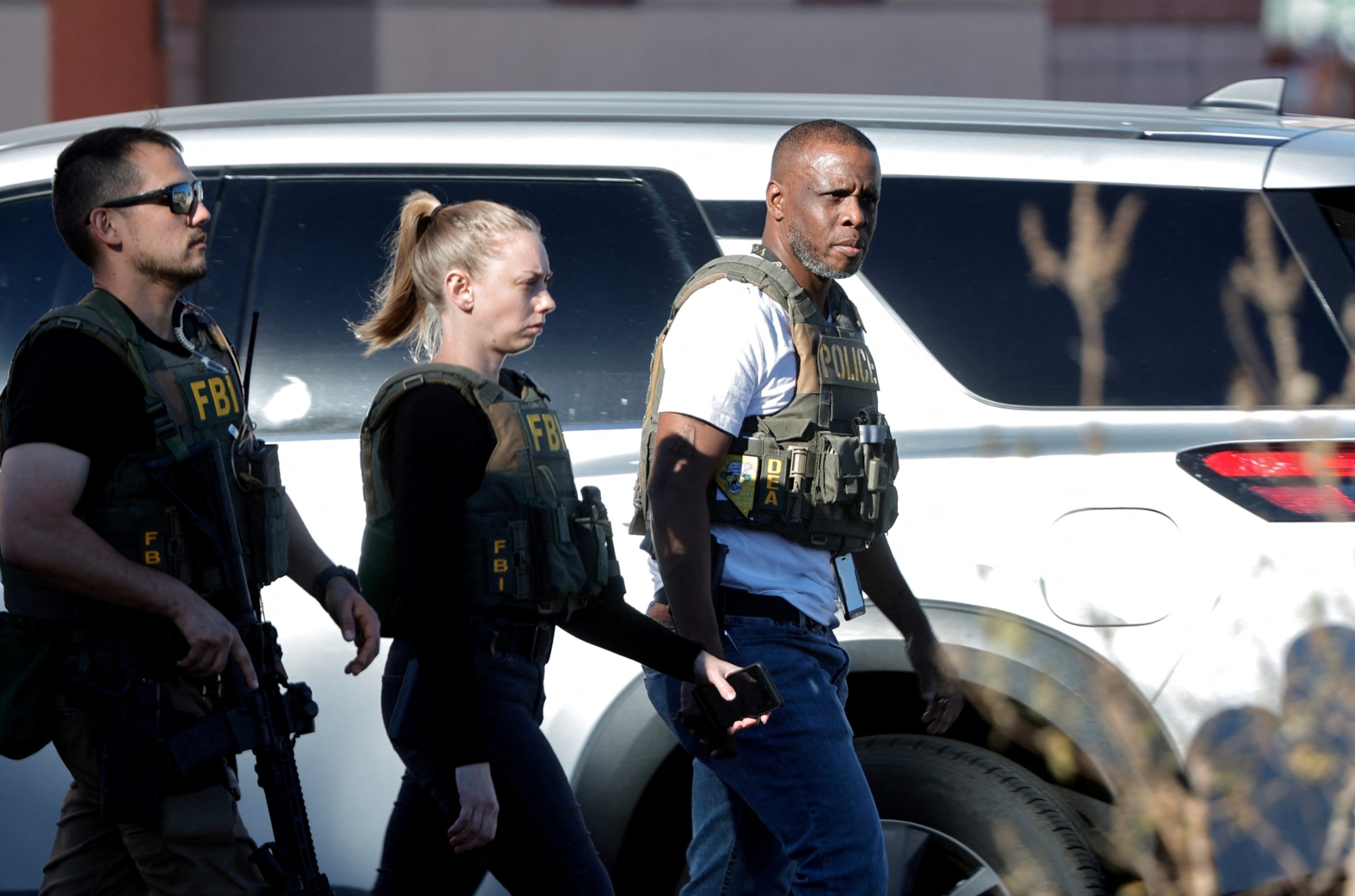 PHOTO: Law enforcement officers walk on the UNLV campus after reports of an active shooter, Dec. 6, 2023, in Las Vegas. 